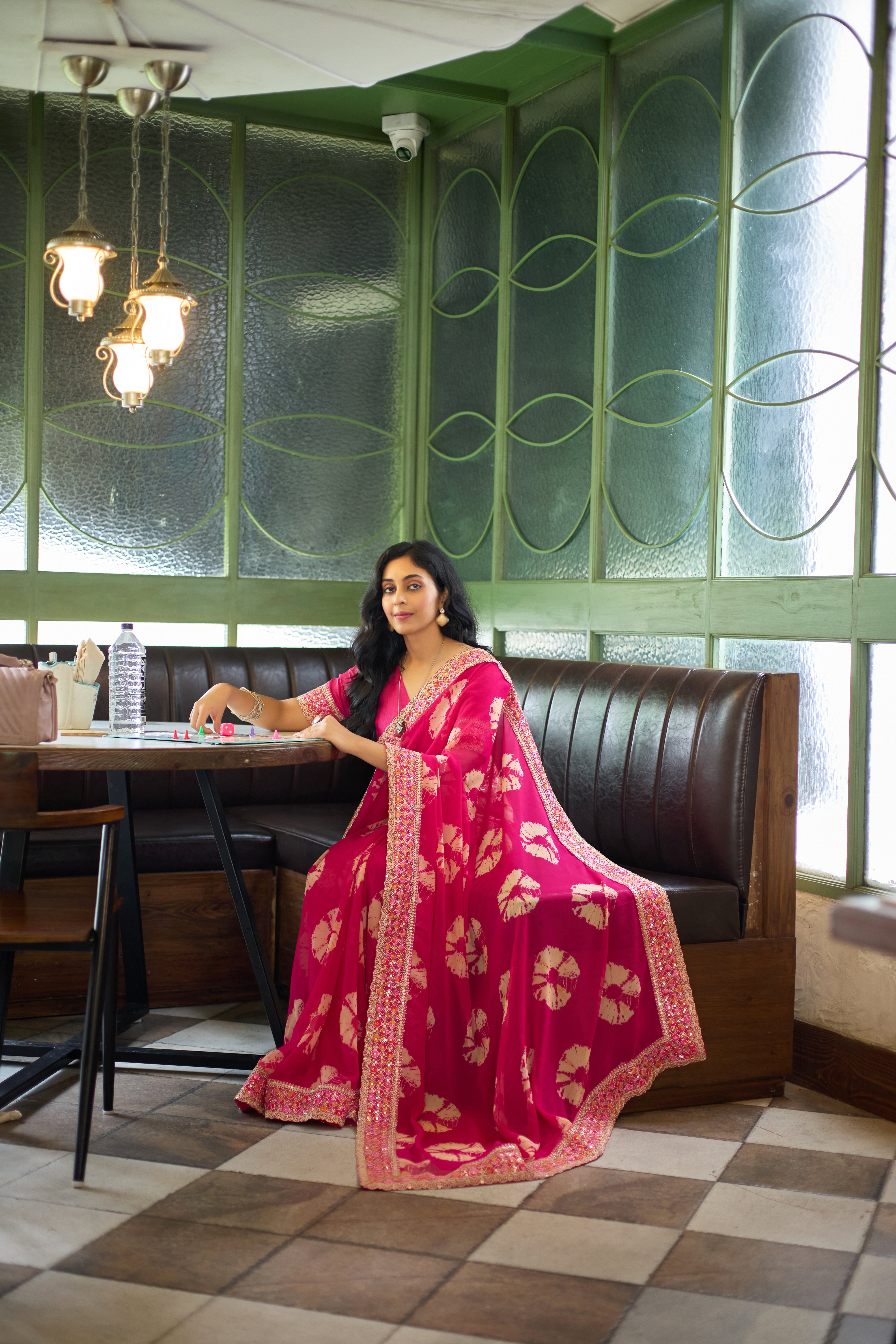Designer Pink Georgette Saree with Heavy Embellished Border