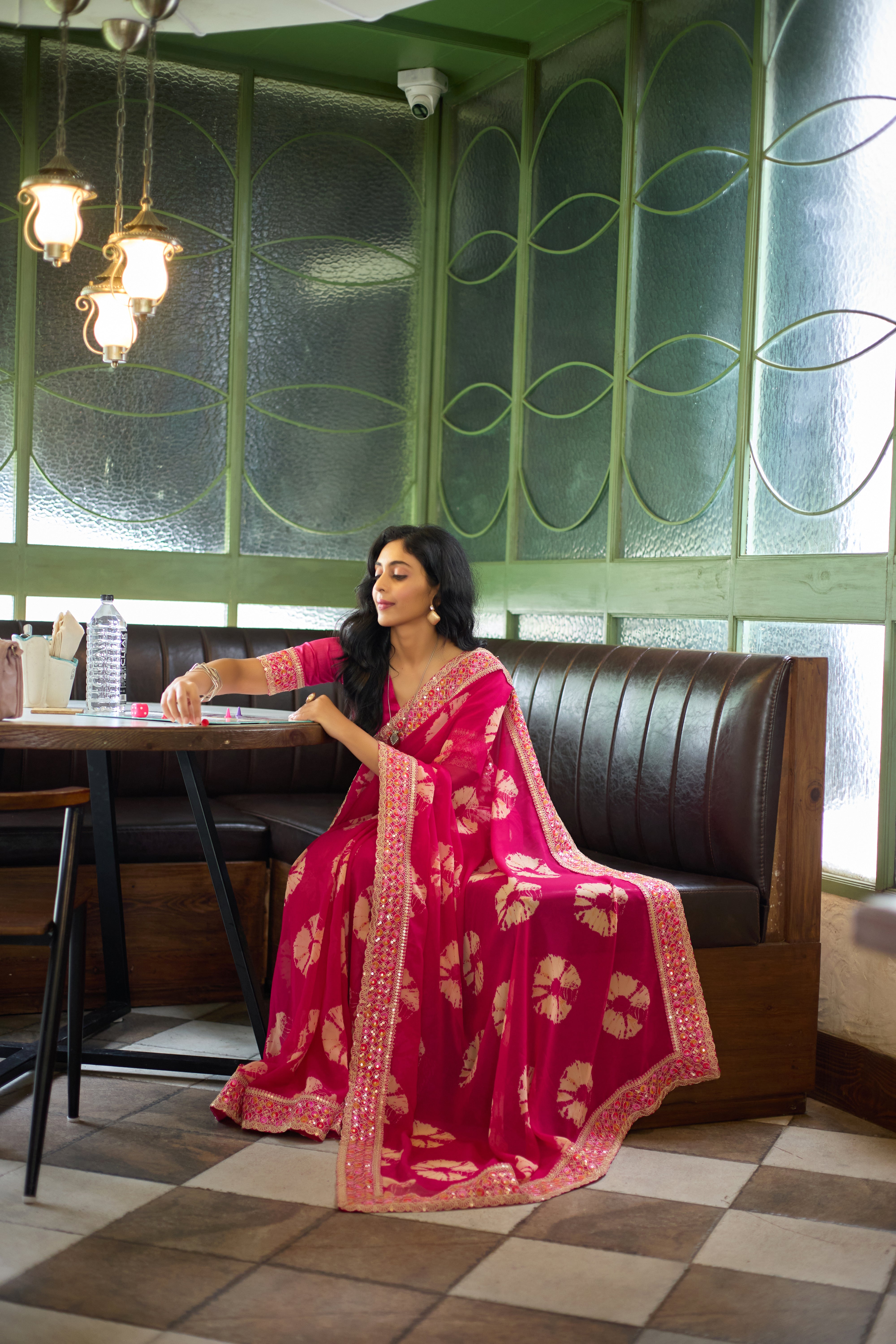 Designer Pink Georgette Saree with Heavy Embellished Border