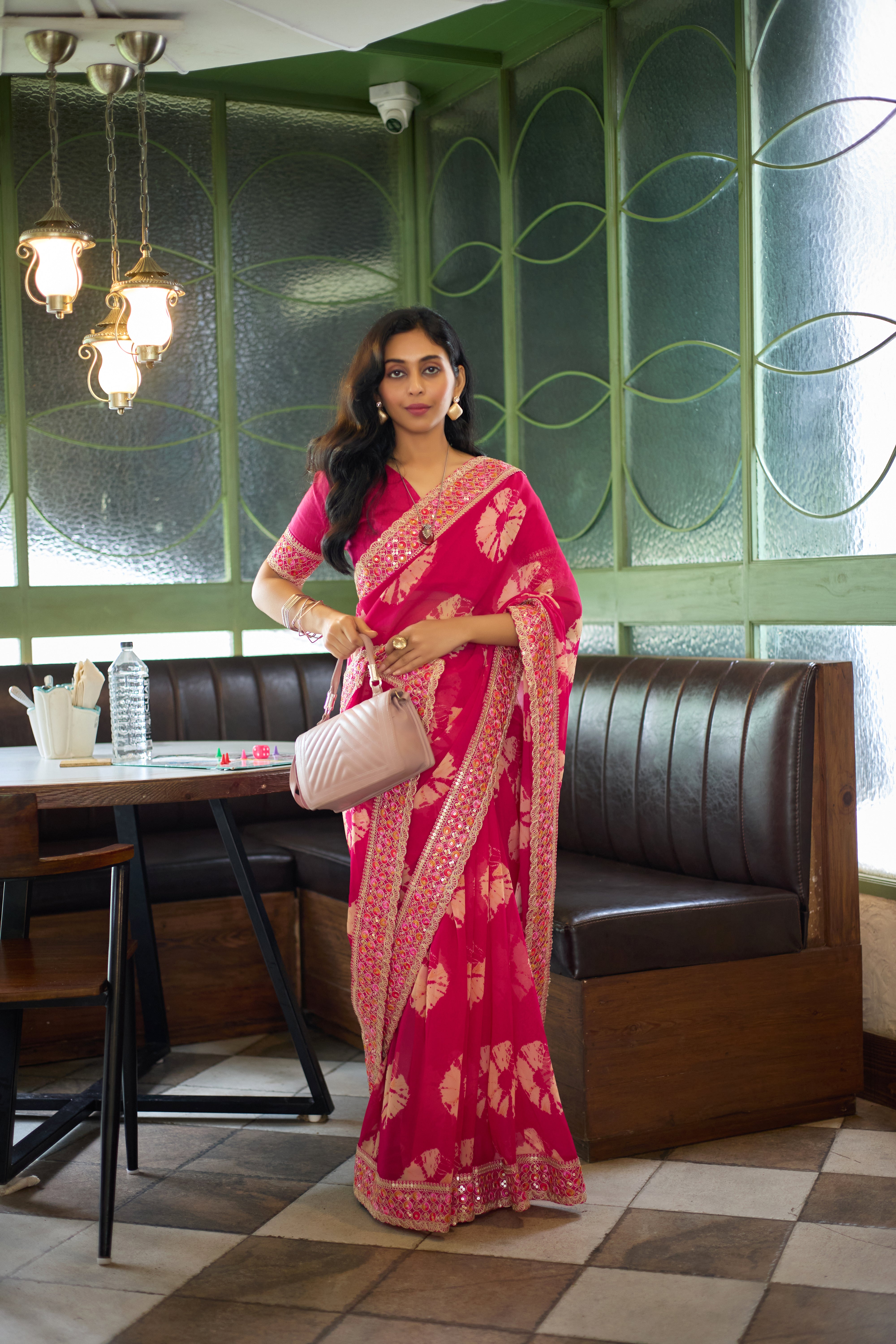 Designer Pink Georgette Saree with Heavy Embellished Border