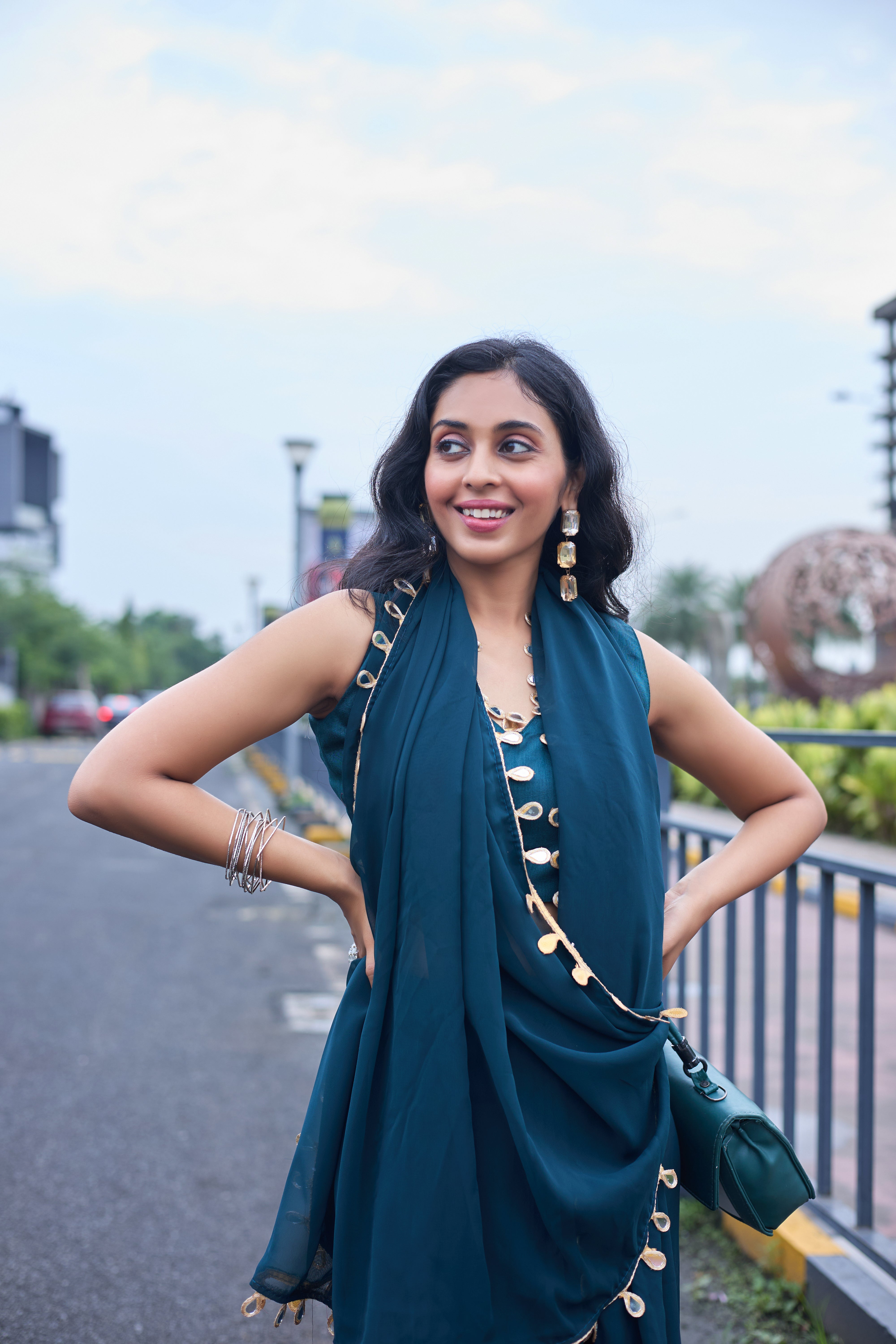 Designer Teal Georgette Saree with Gold Coin Border
