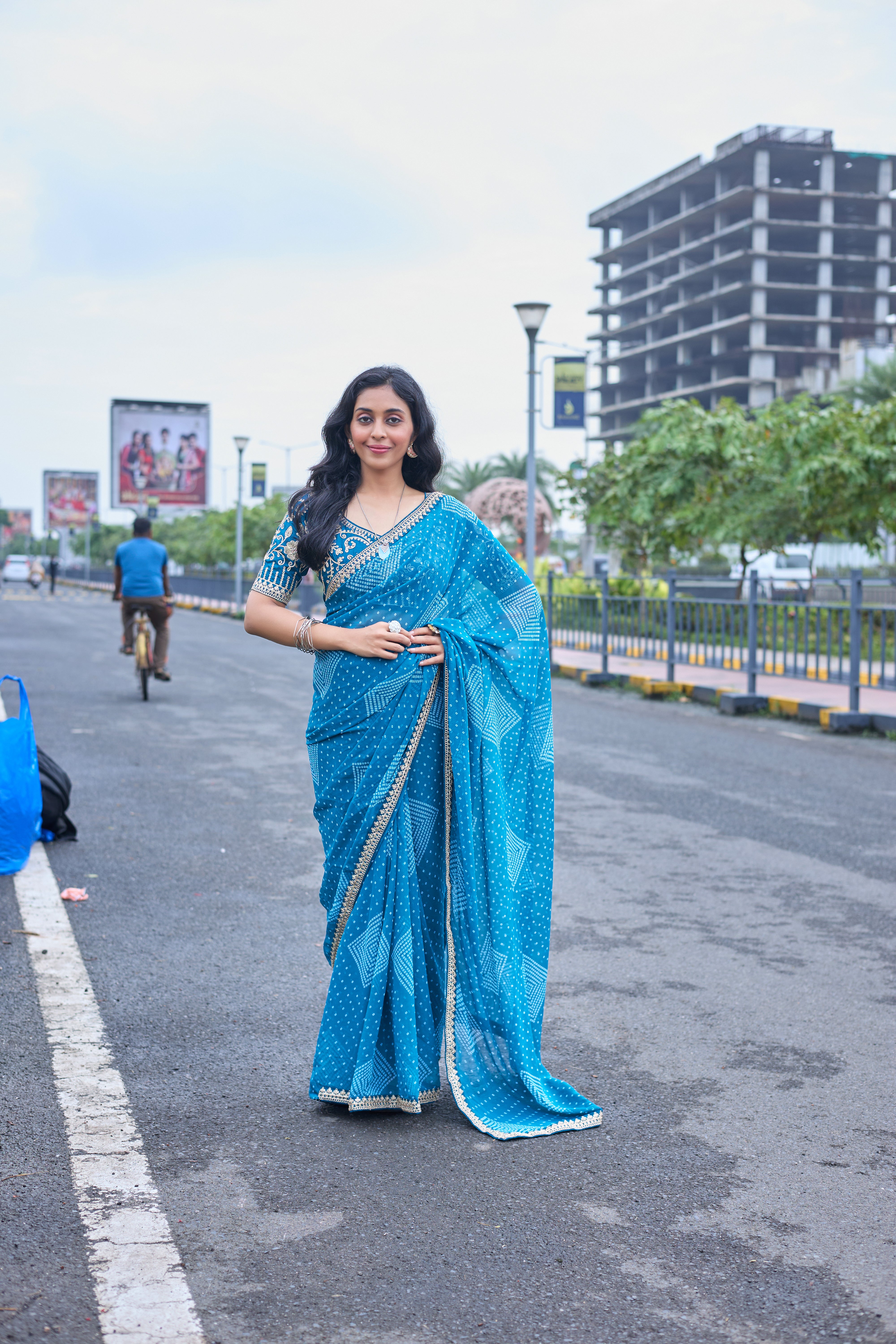 Azure Blue Bandhani Georgette Saree with Embellished Border