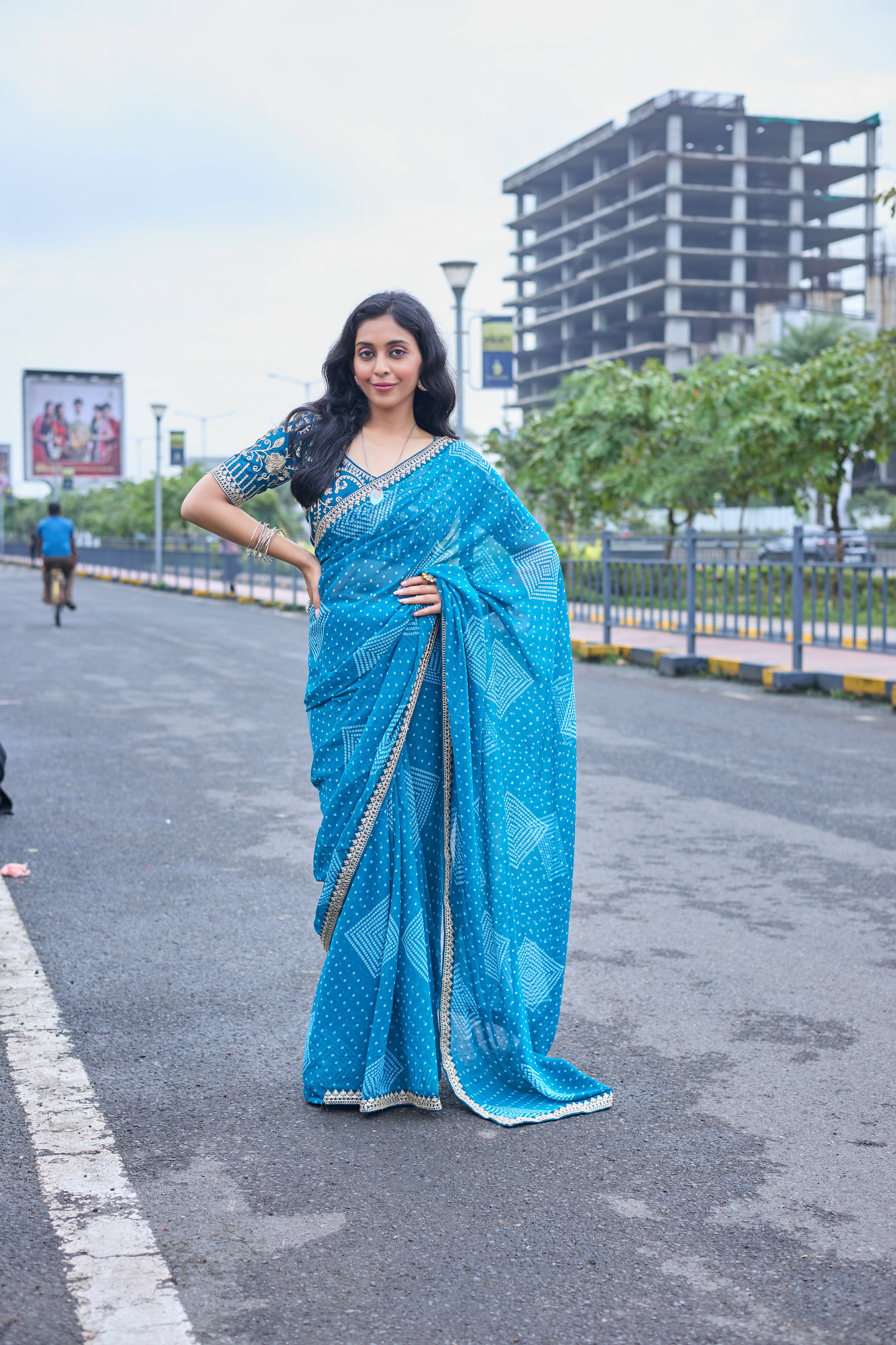 Azure Blue Bandhani Georgette Saree with Embellished Border