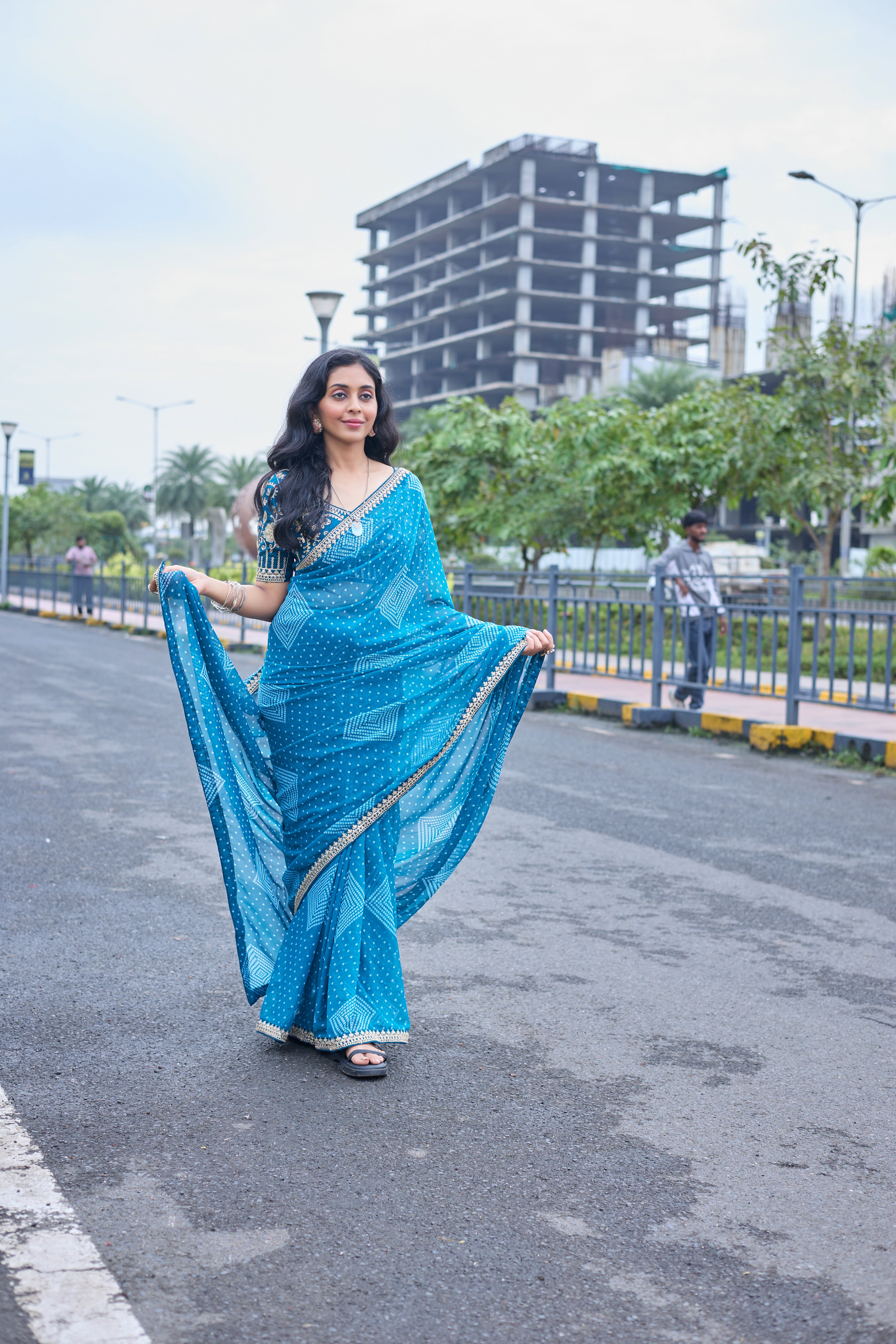 Azure Blue Bandhani Georgette Saree with Embellished Border
