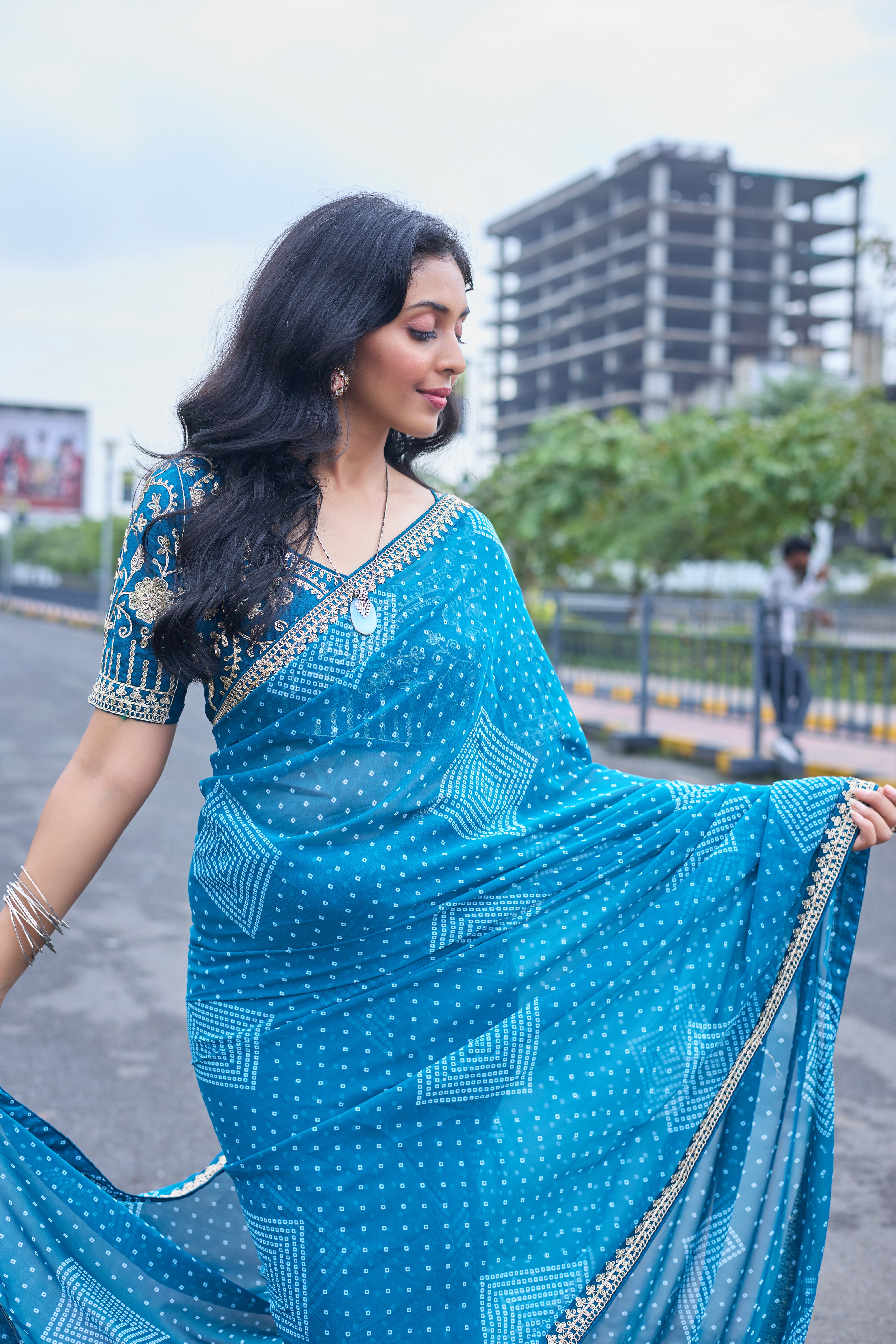 Azure Blue Bandhani Georgette Saree with Embellished Border