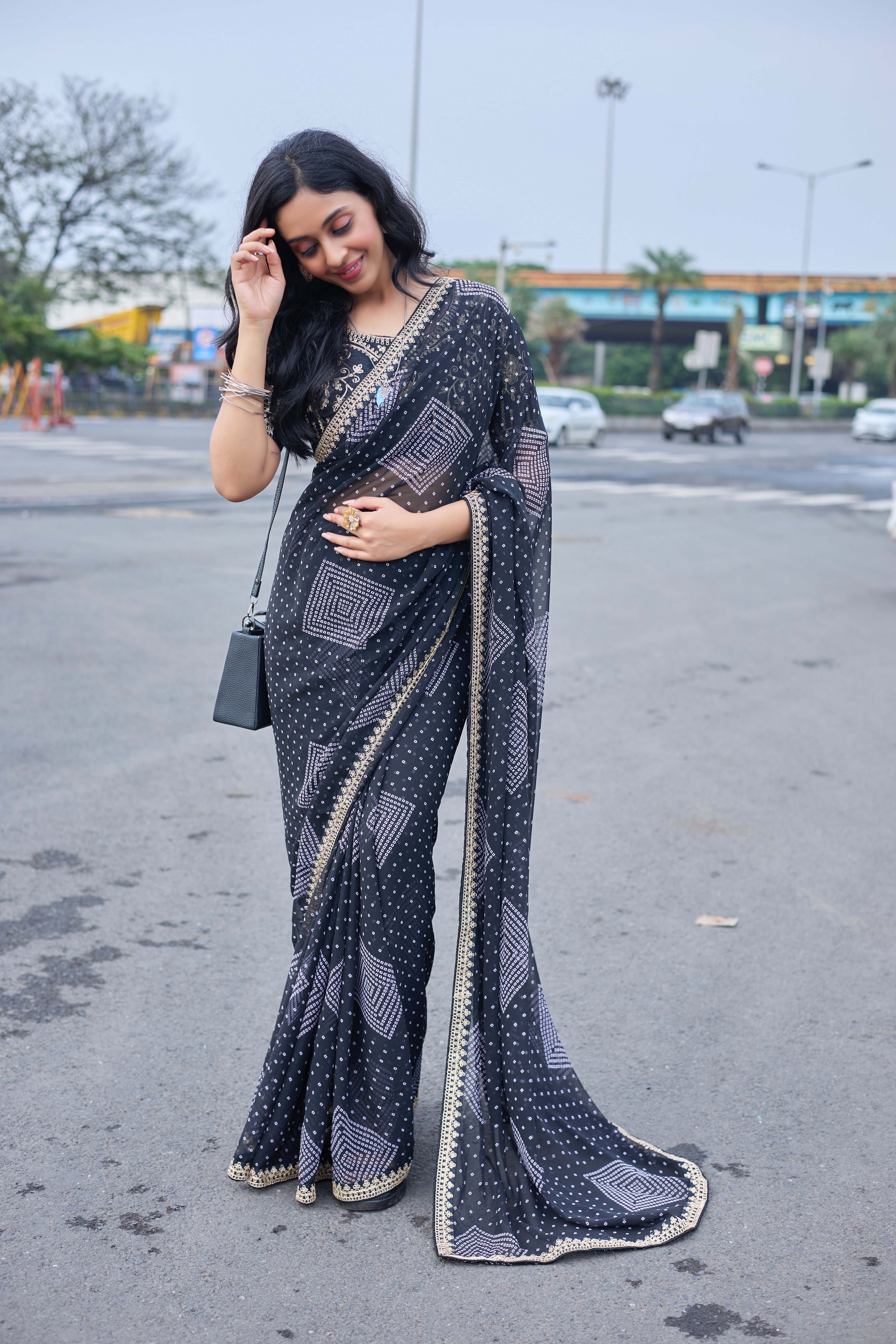 Midnight Charm Black Printed Saree with Golden Lace Border