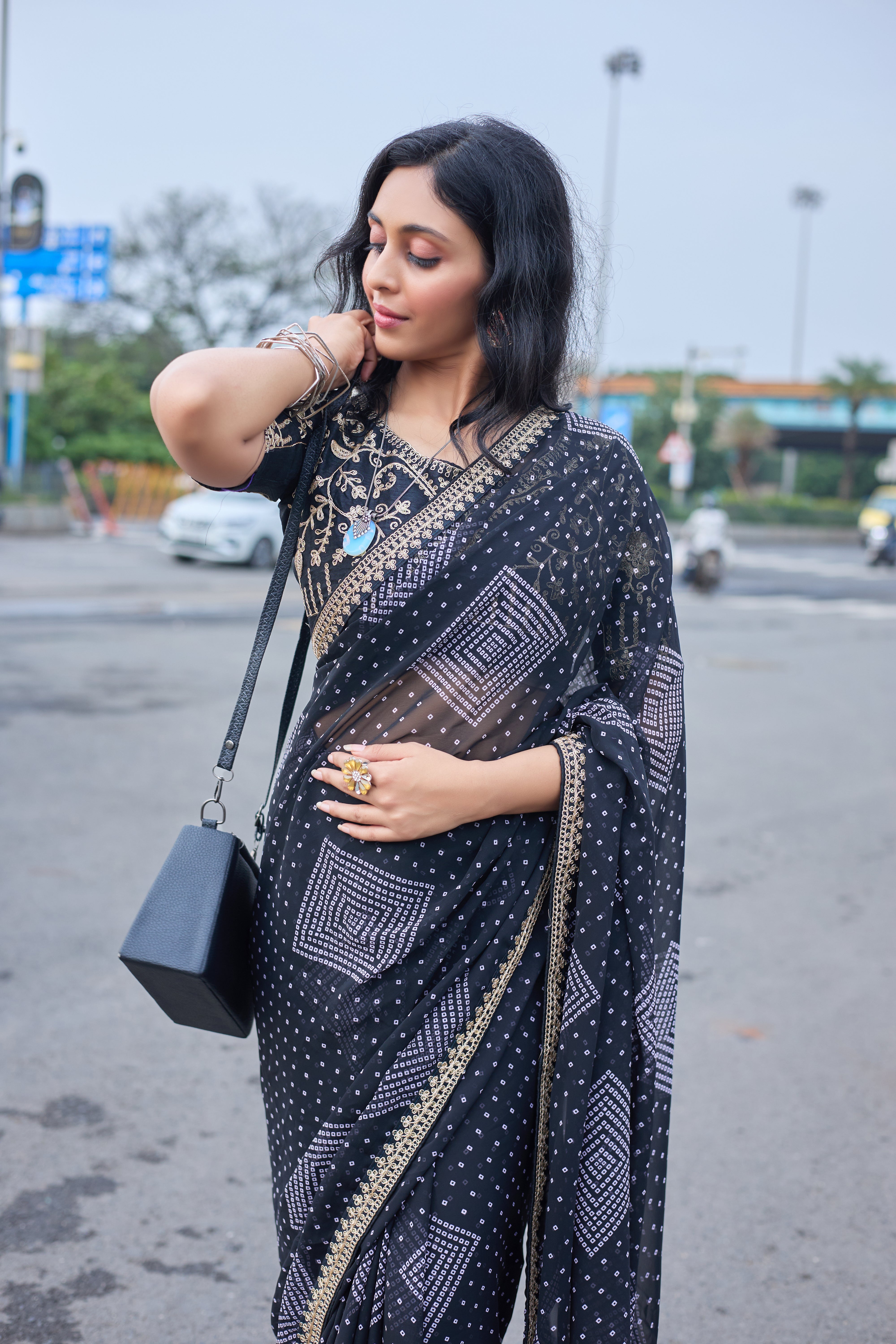 Midnight Charm Black Printed Saree with Golden Lace Border