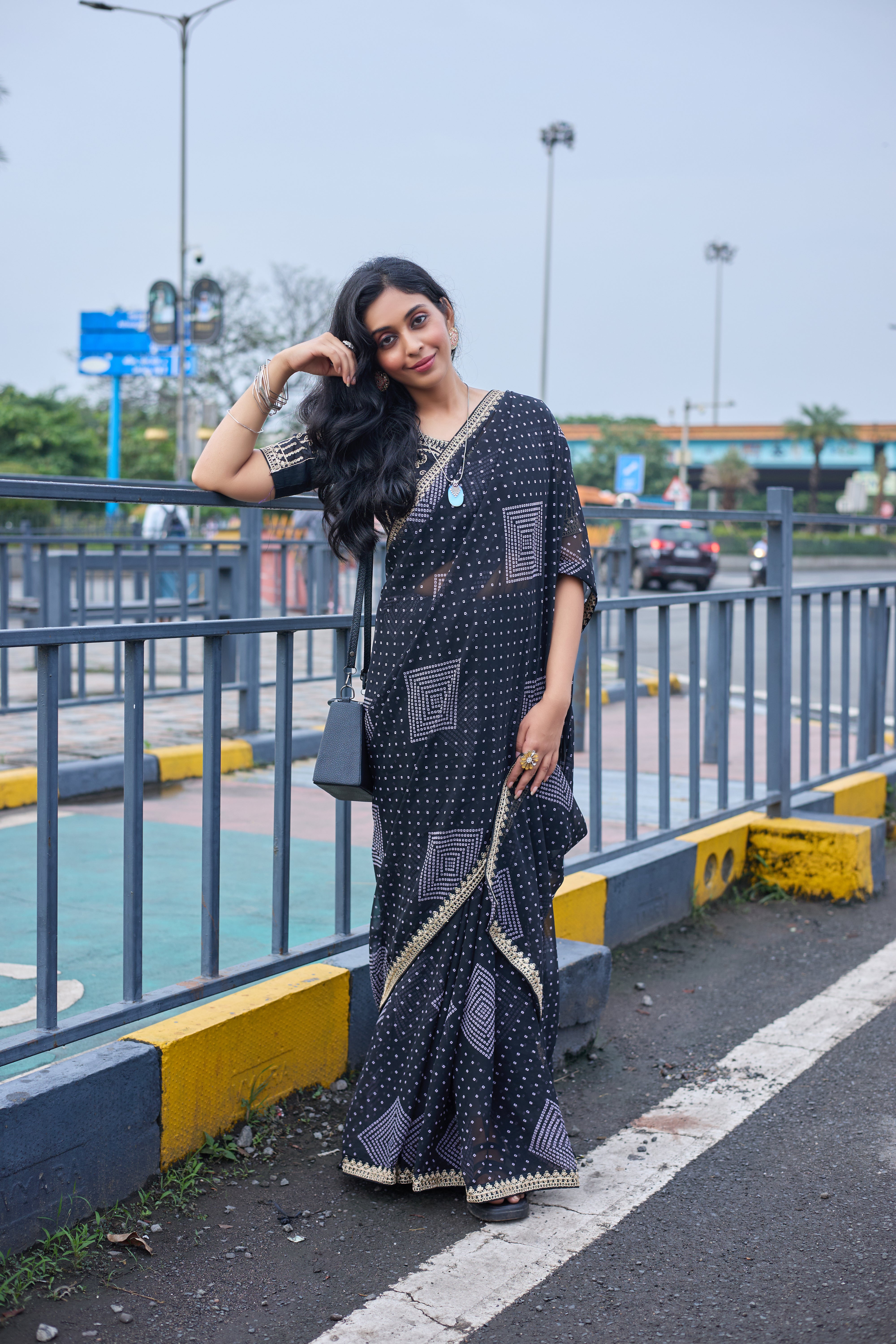 Midnight Charm Black Printed Saree with Golden Lace Border