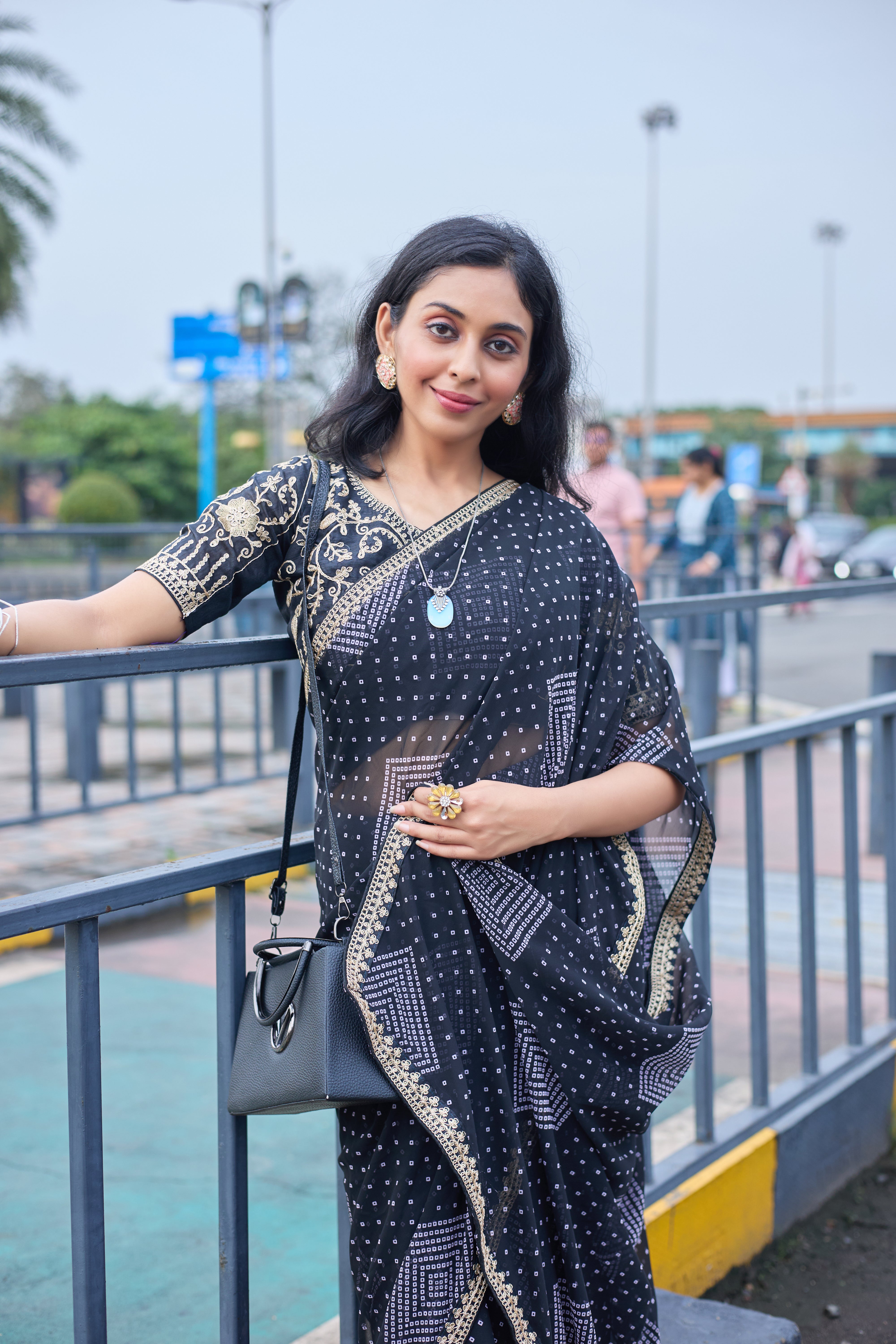 Midnight Charm Black Printed Saree with Golden Lace Border