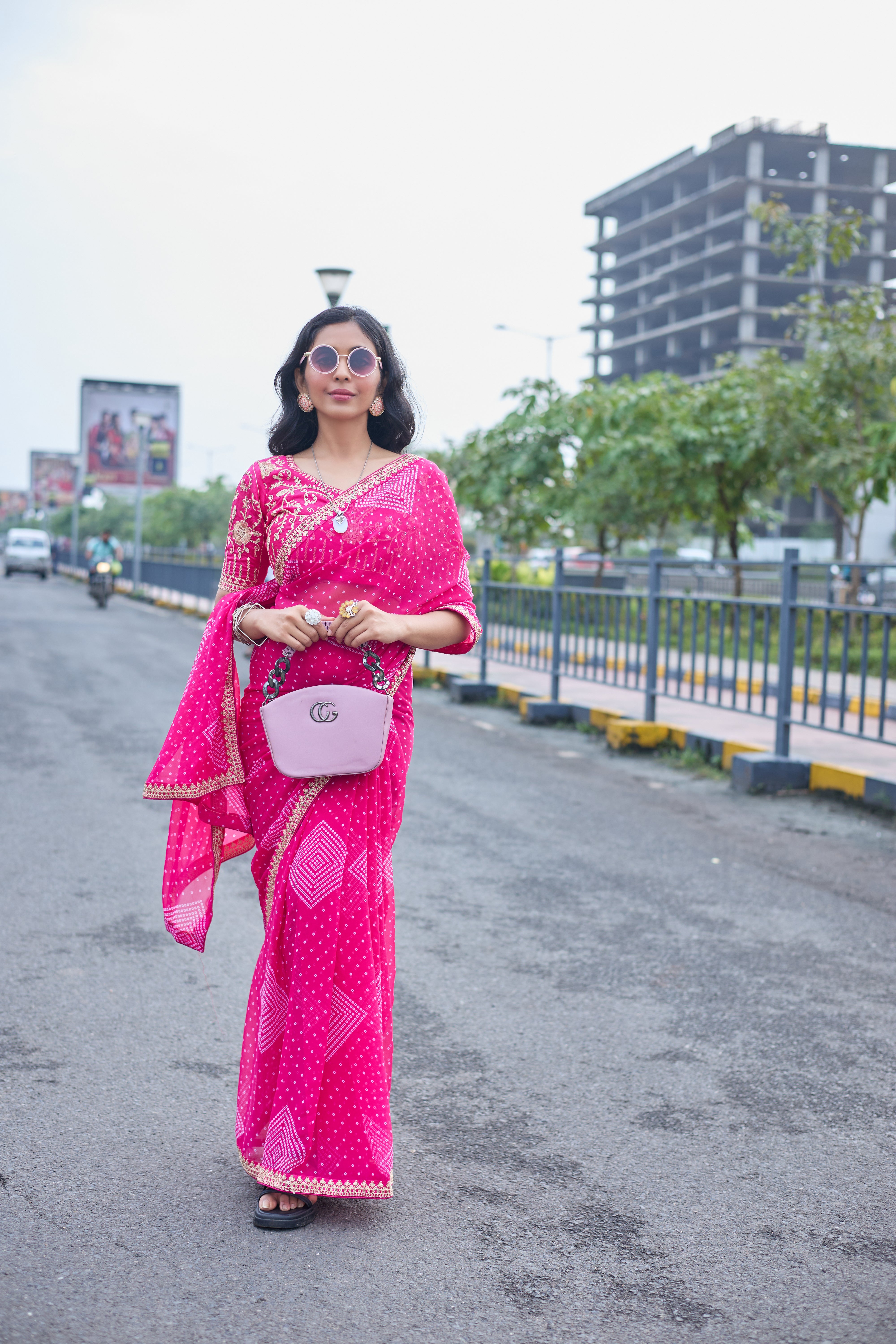 Fuchsia Radiance Bandhani Georgette Saree with Golden Lace Border