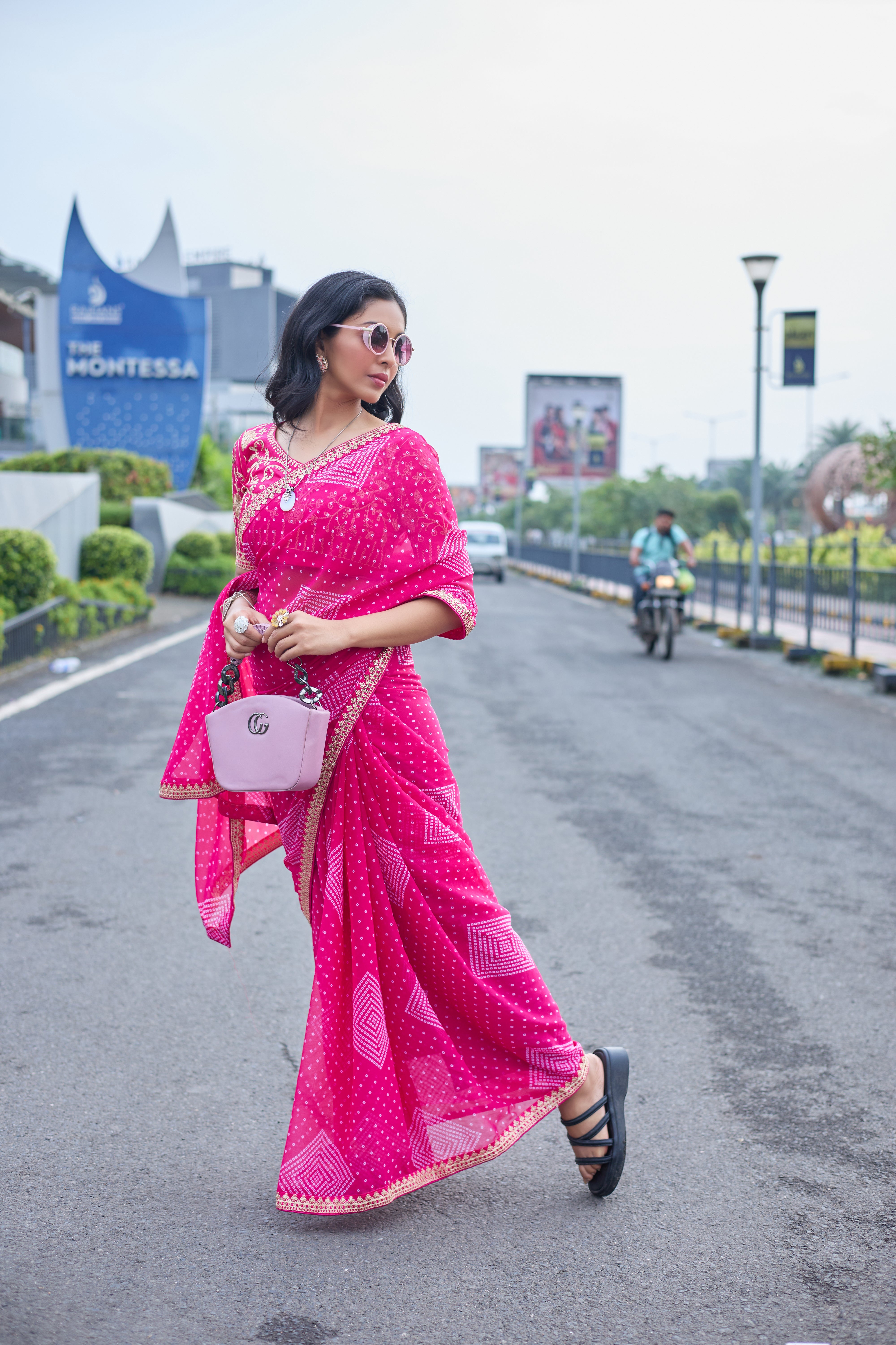 Fuchsia Radiance Bandhani Georgette Saree with Golden Lace Border