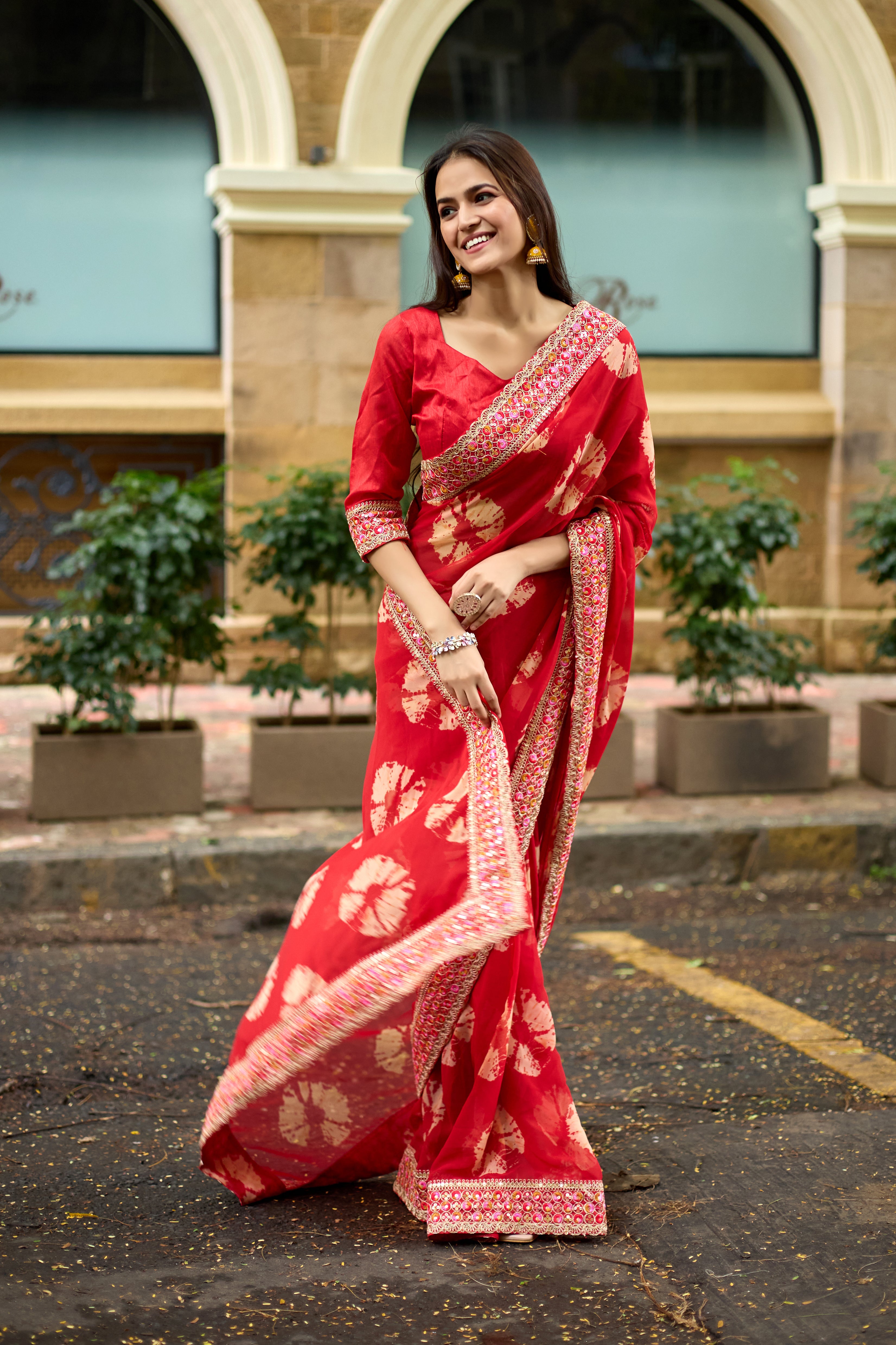 Vibrant Red Batik Georgette Saree with Embroidered Border