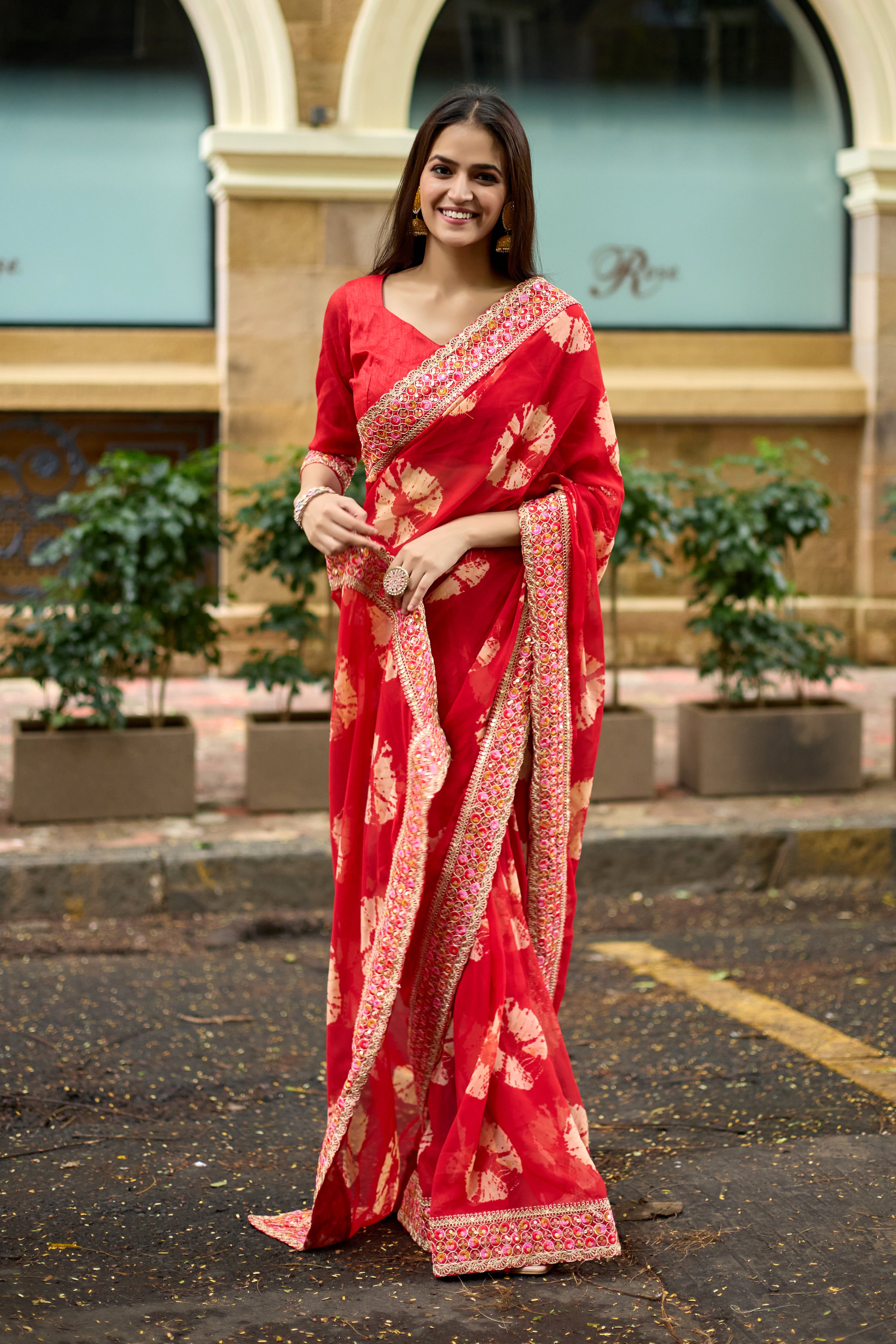 Vibrant Red Batik Georgette Saree with Embroidered Border
