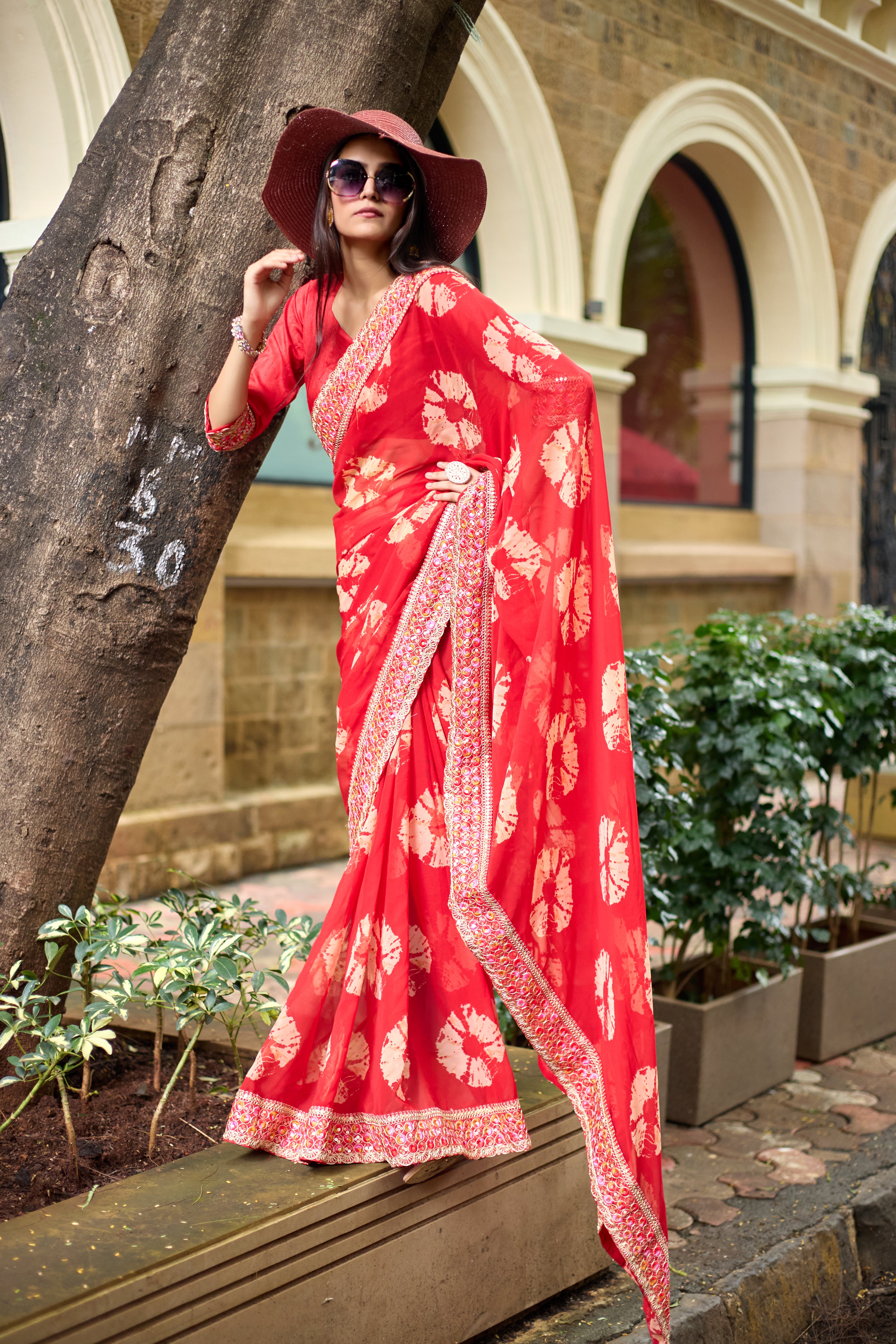Vibrant Red Batik Georgette Saree with Embroidered Border