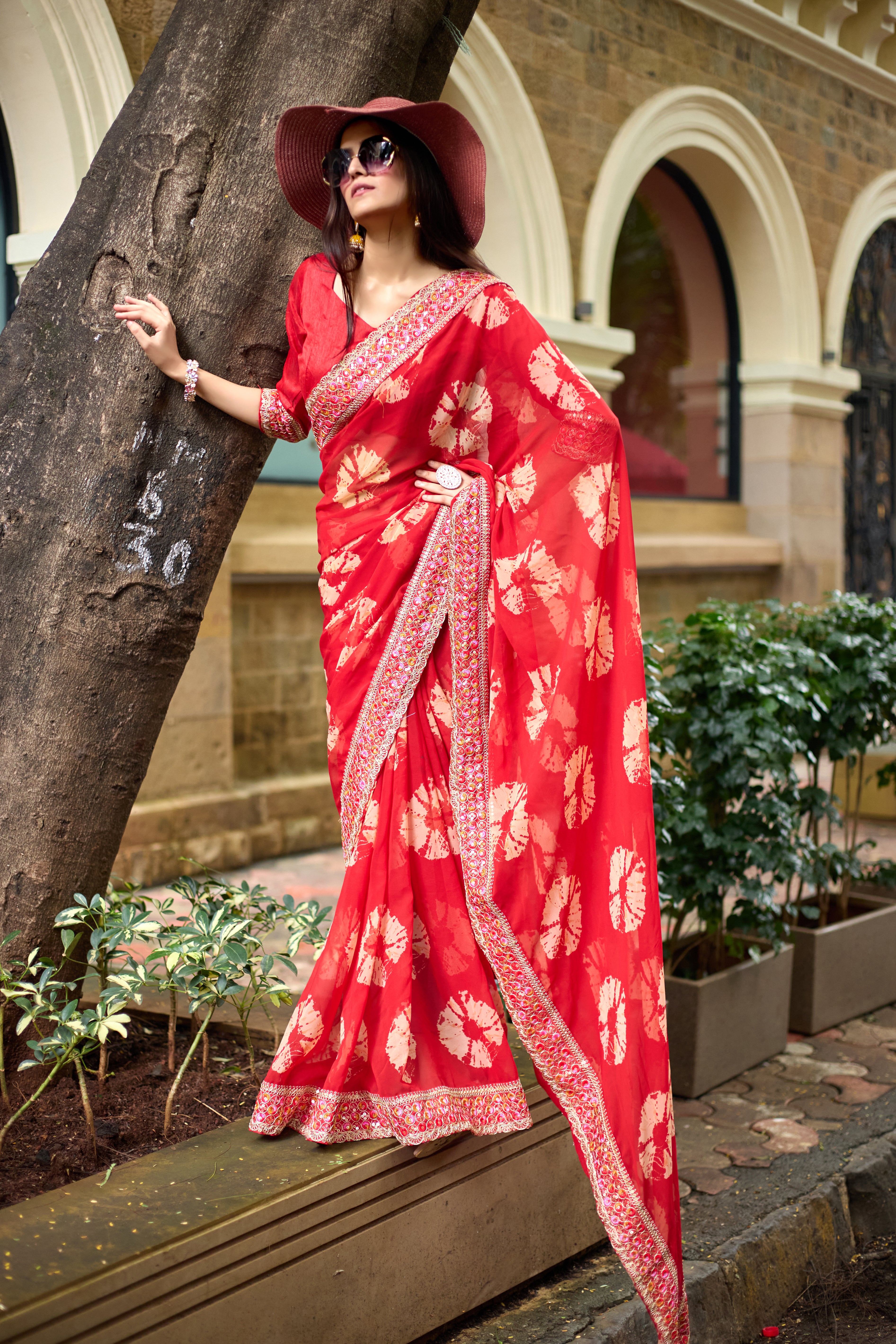 Vibrant Red Batik Georgette Saree with Embroidered Border
