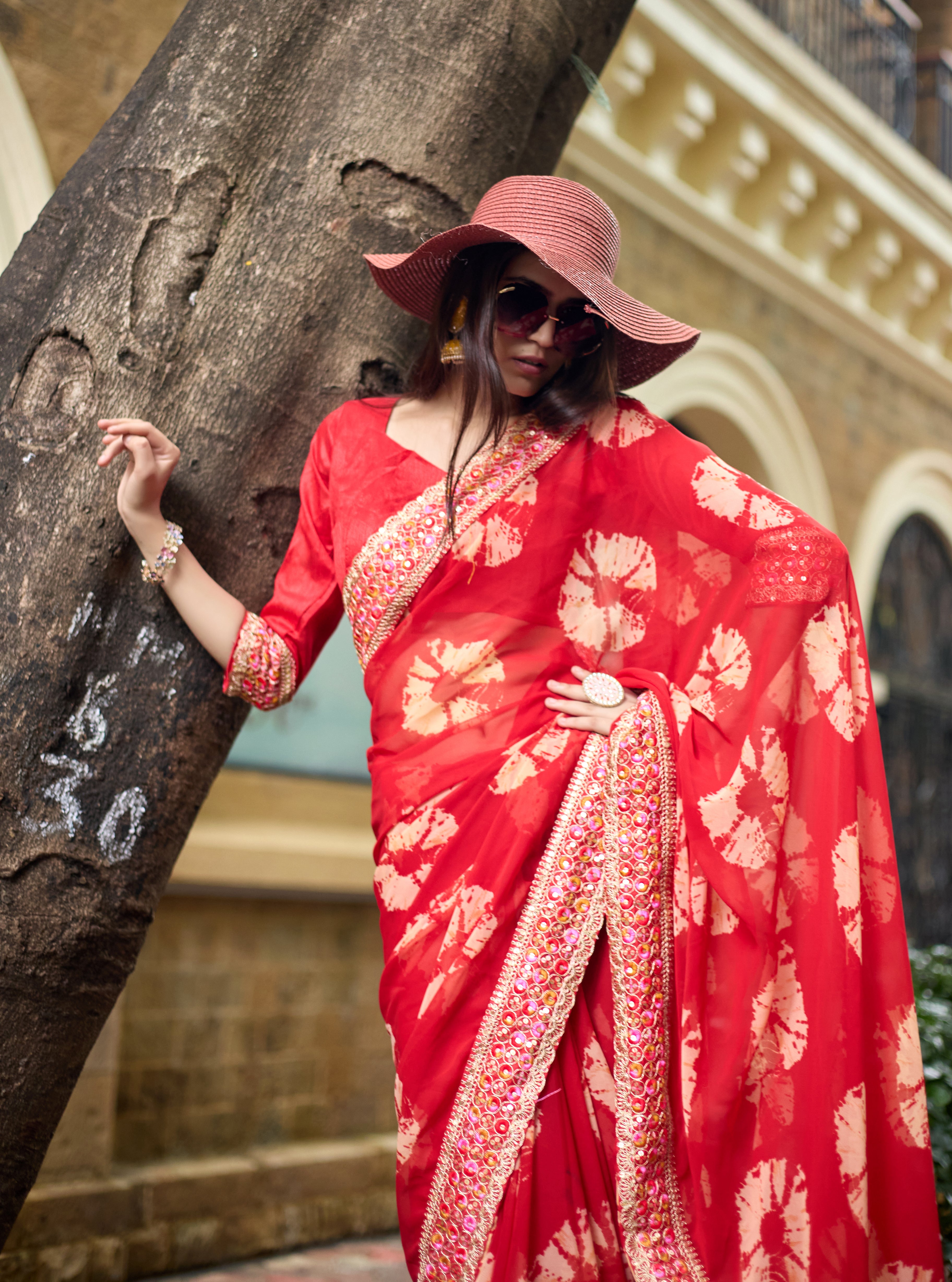 Vibrant Red Batik Georgette Saree with Embroidered Border