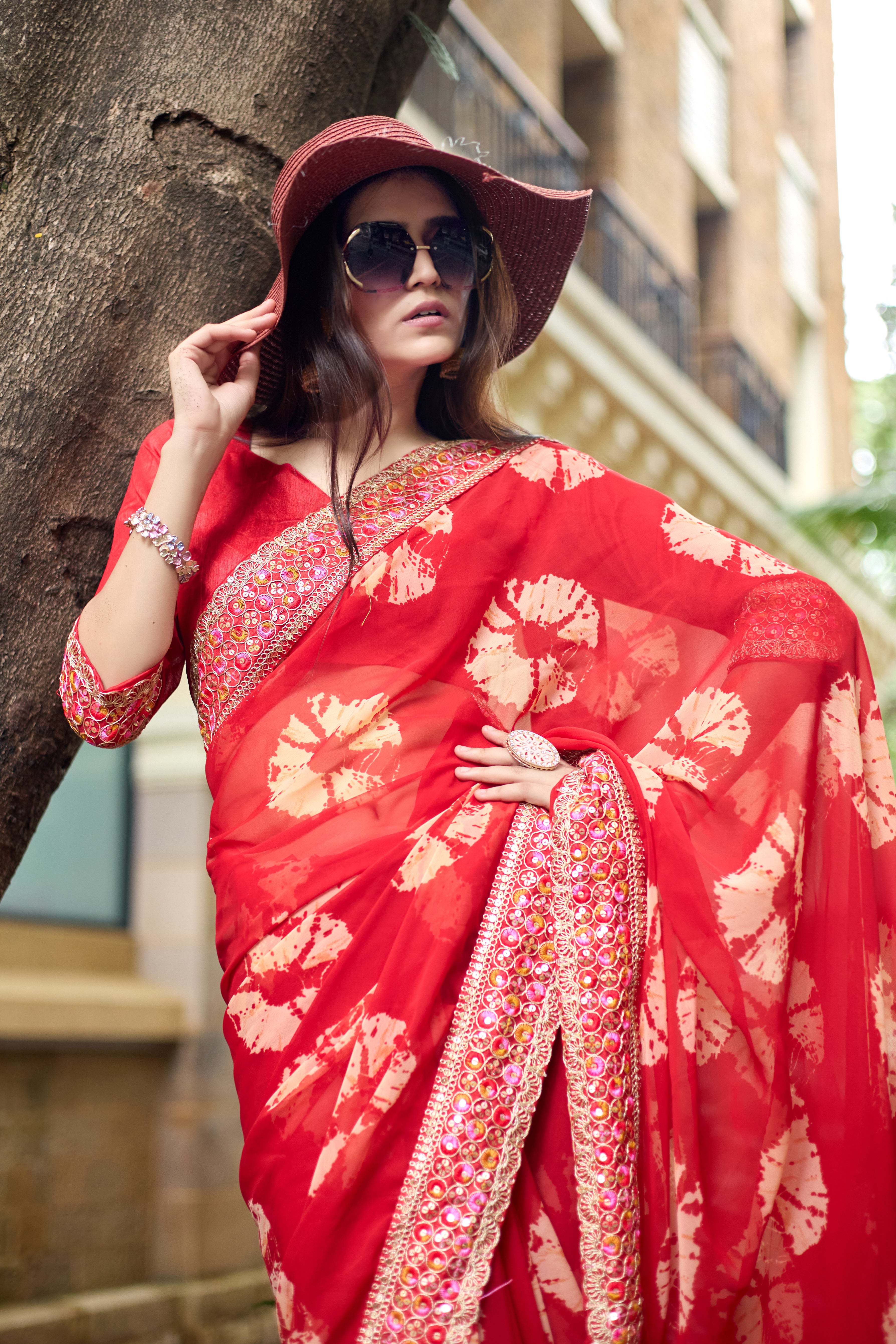 Vibrant Red Batik Georgette Saree with Embroidered Border