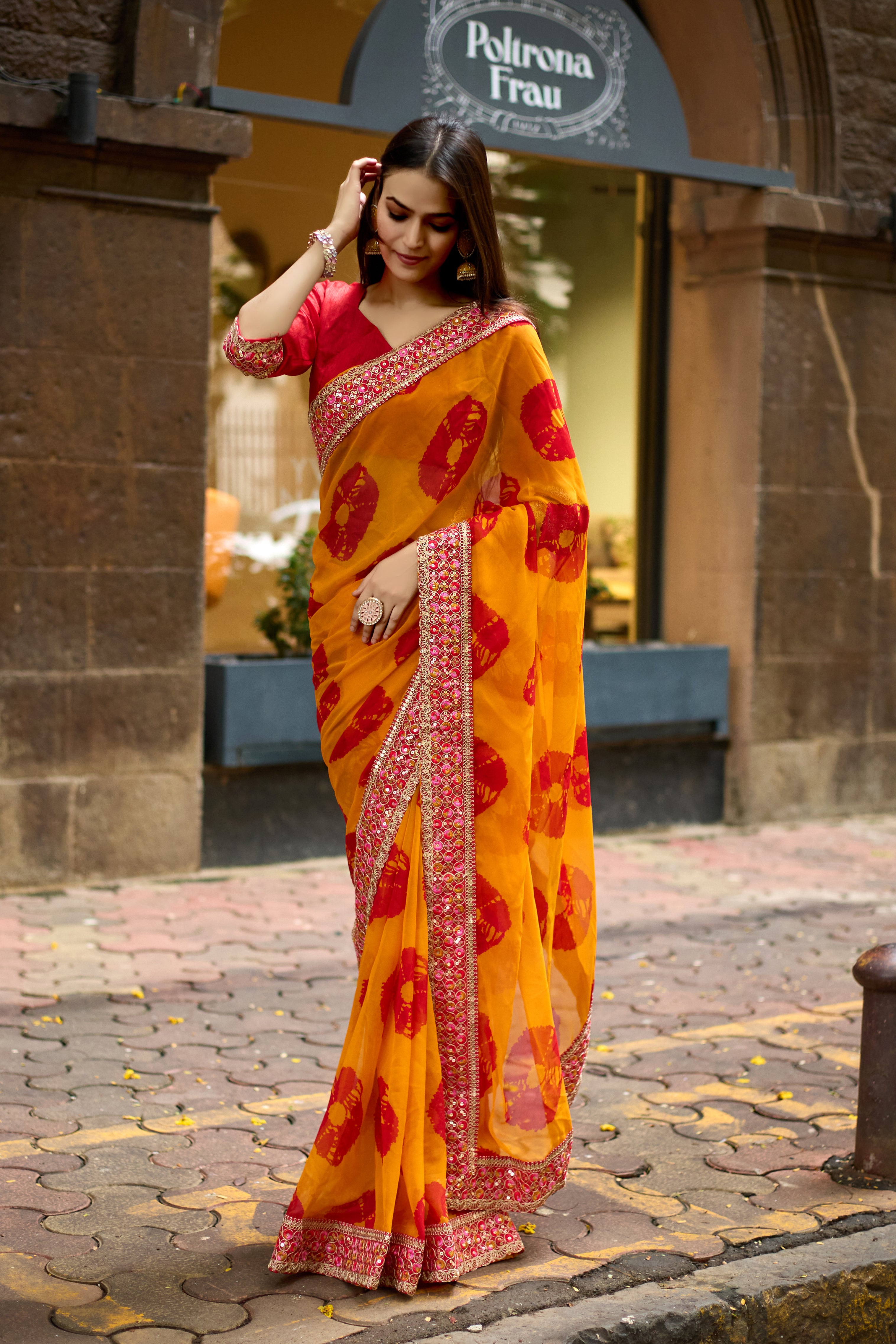 Vibrant Musted Batik Georgette Saree with Embroidered Border