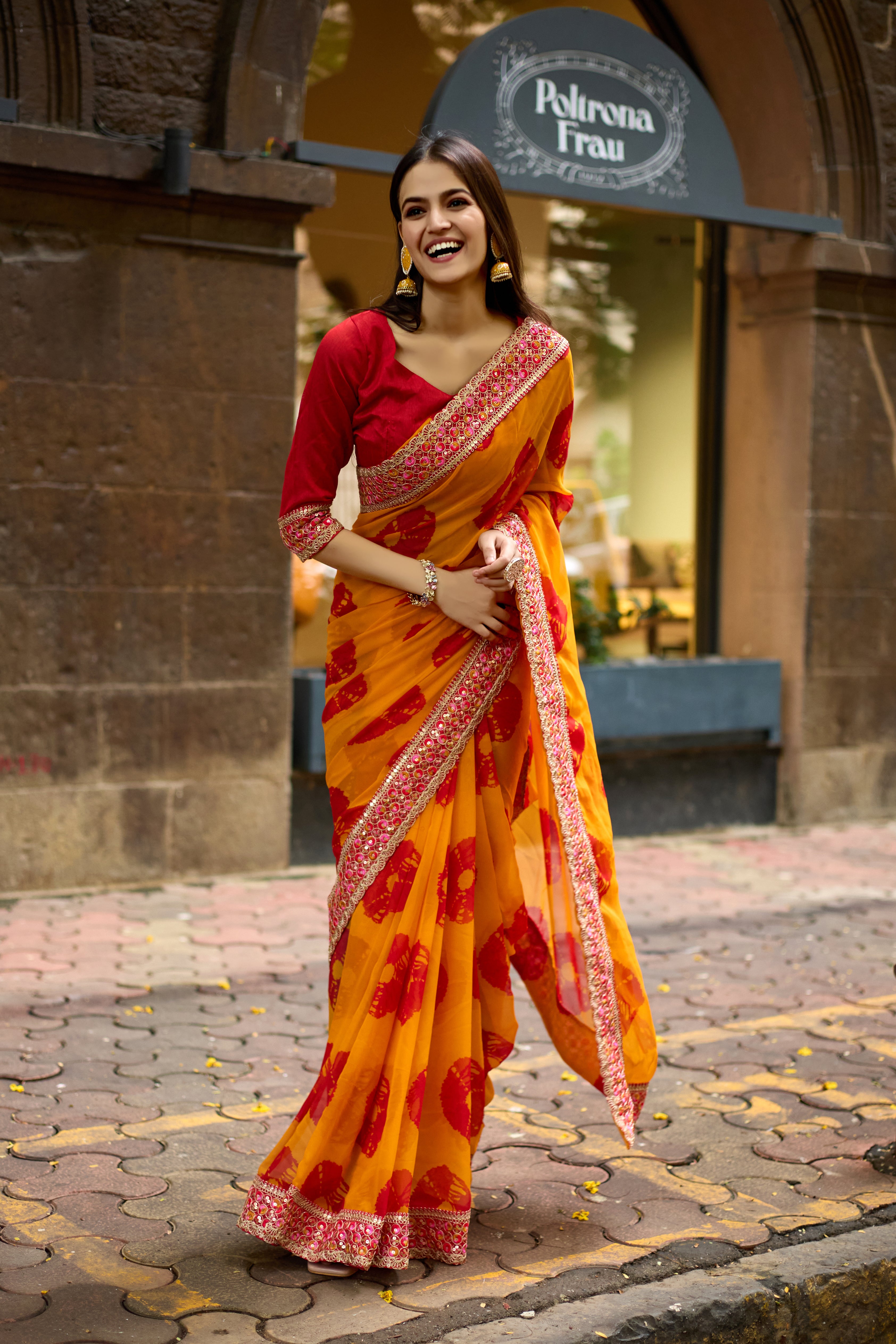 Vibrant Musted Batik Georgette Saree with Embroidered Border