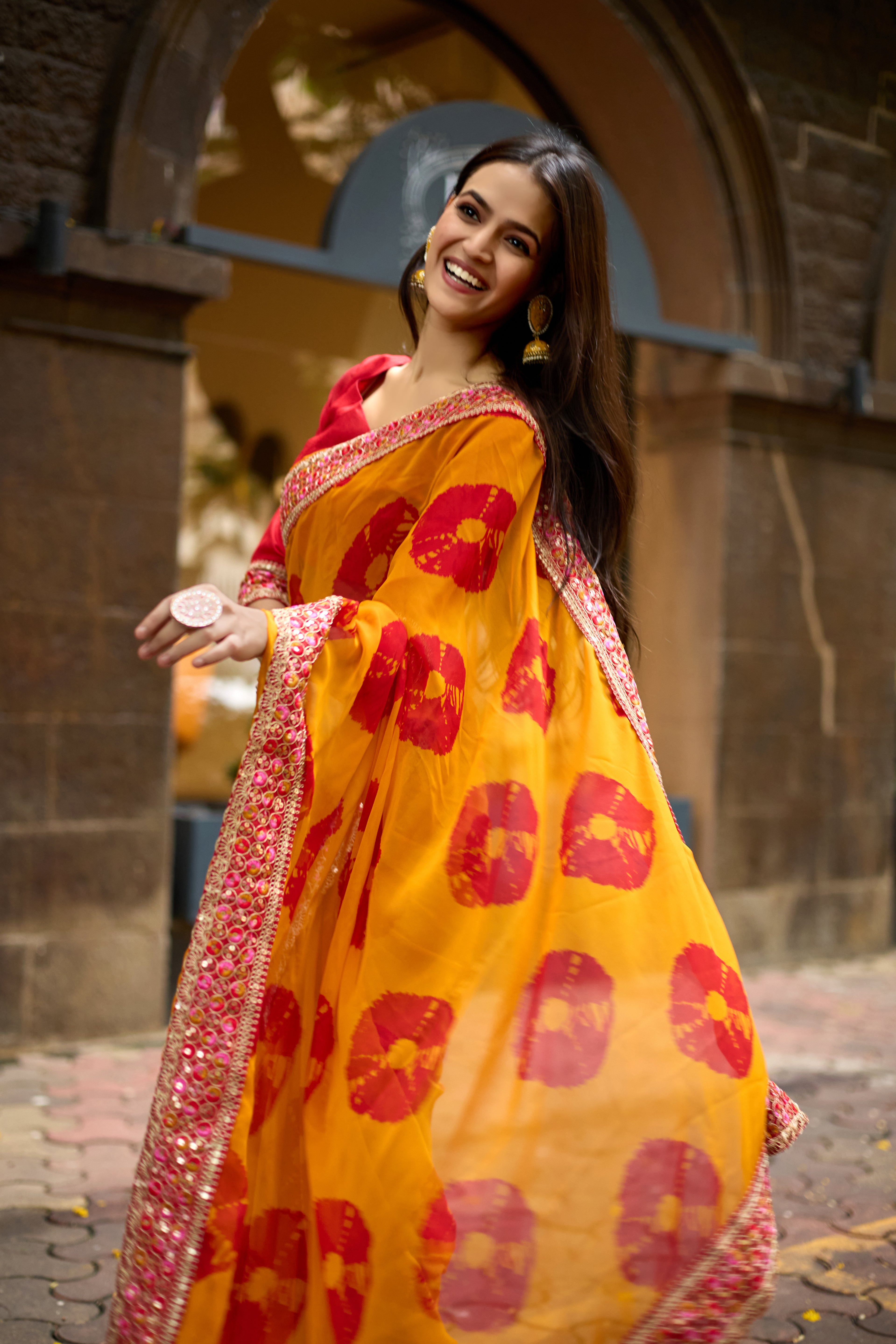 Vibrant Musted Batik Georgette Saree with Embroidered Border