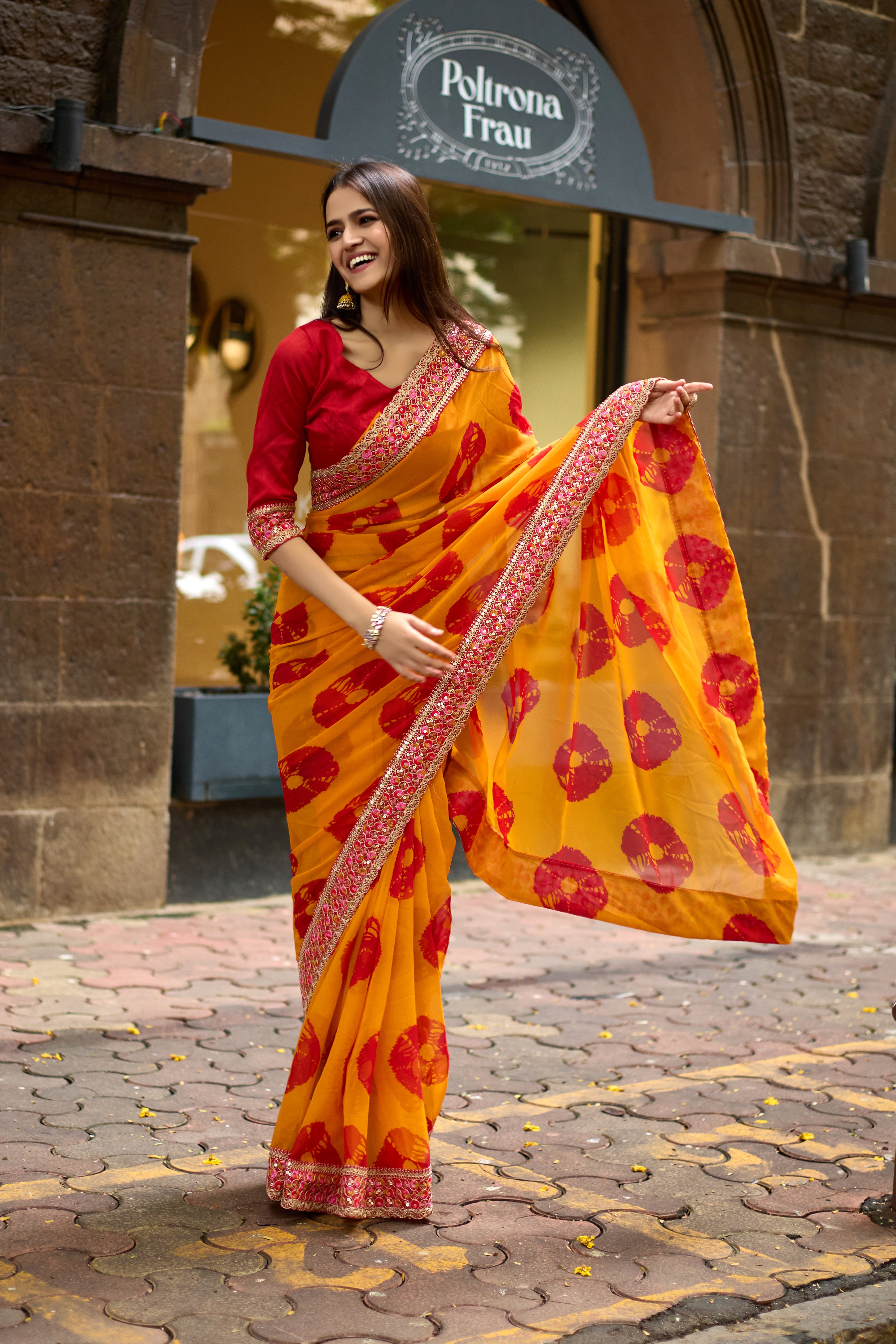 Vibrant Musted Batik Georgette Saree with Embroidered Border