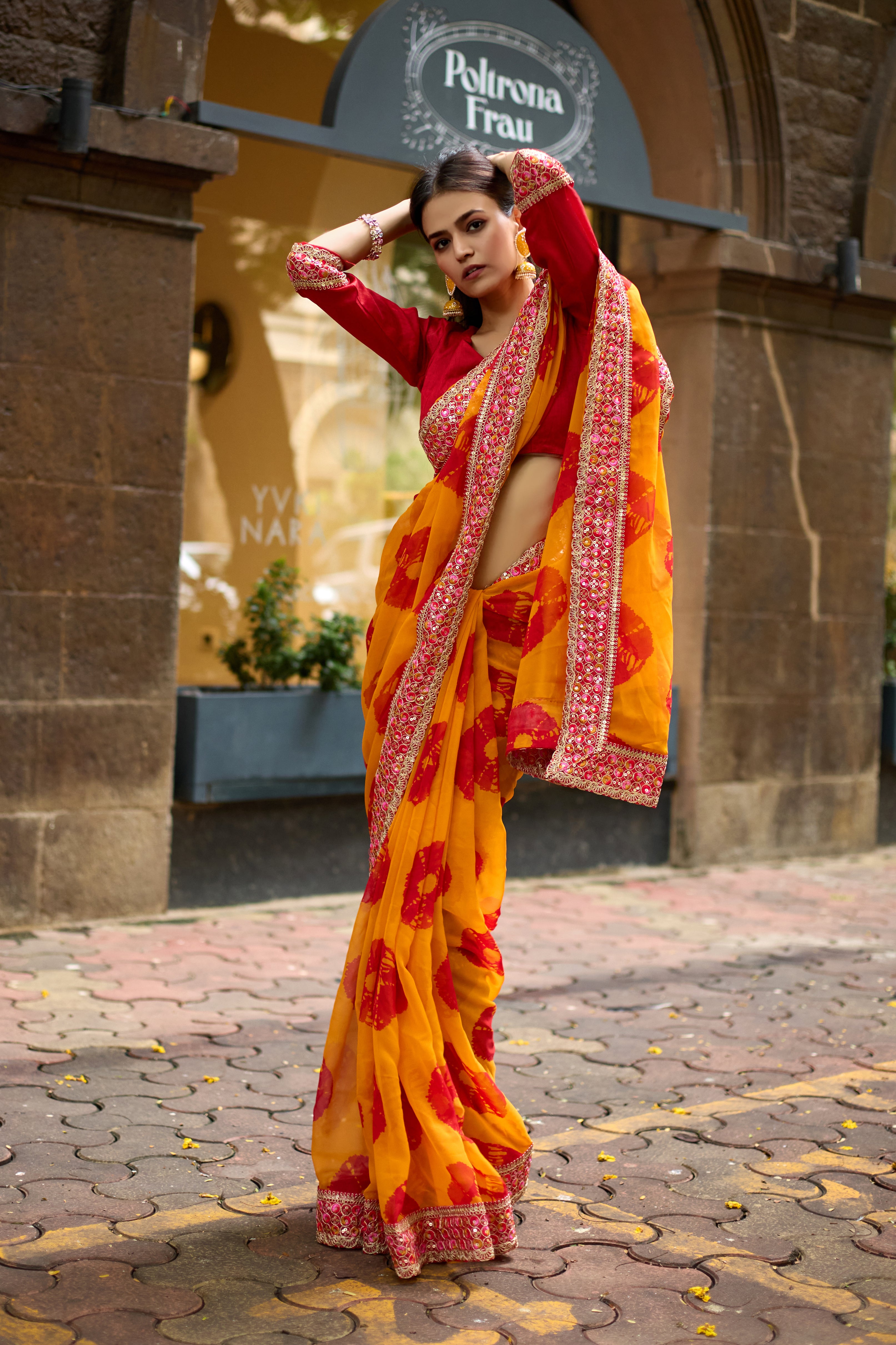 Vibrant Musted Batik Georgette Saree with Embroidered Border