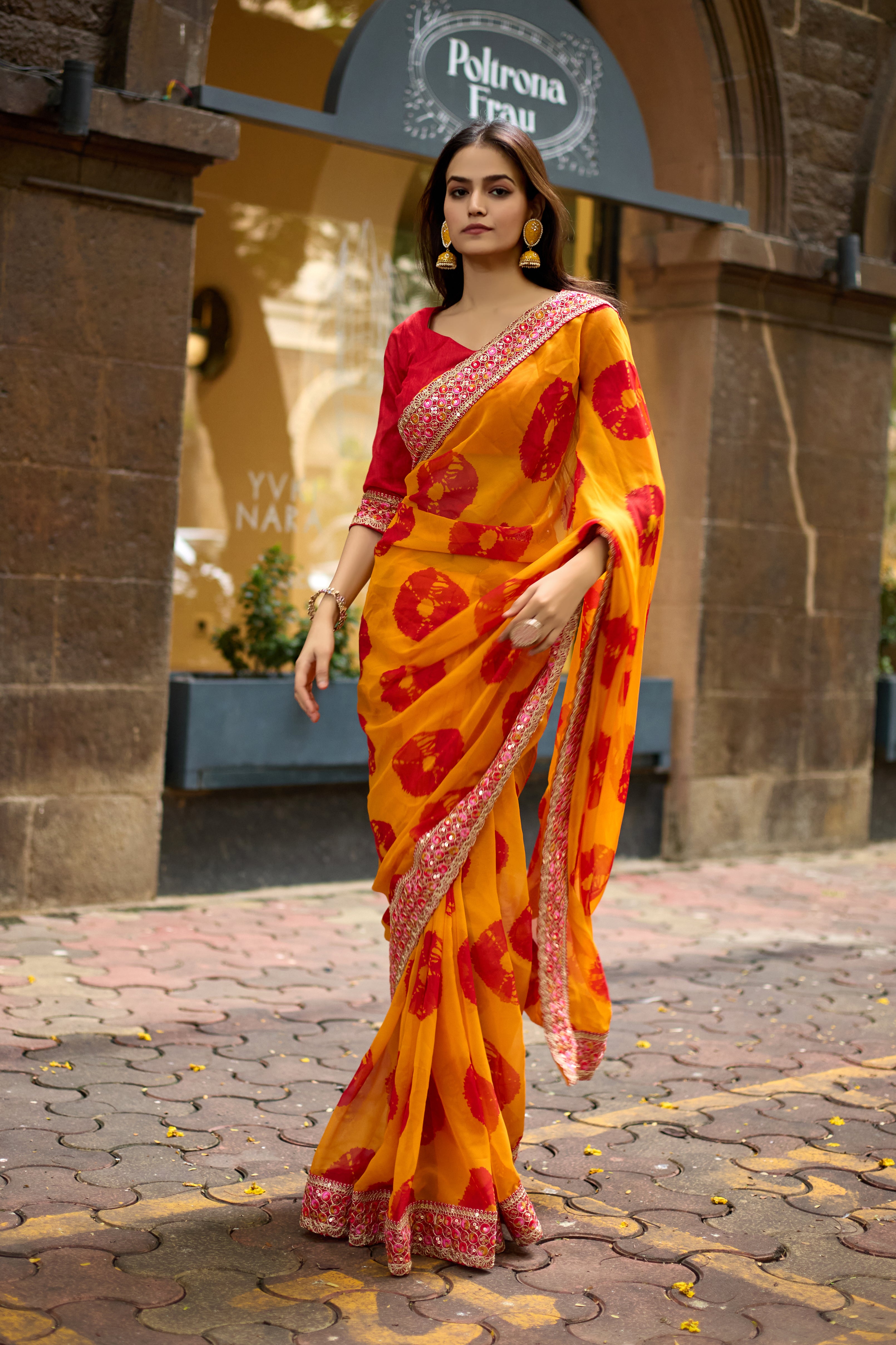 Vibrant Musted Batik Georgette Saree with Embroidered Border