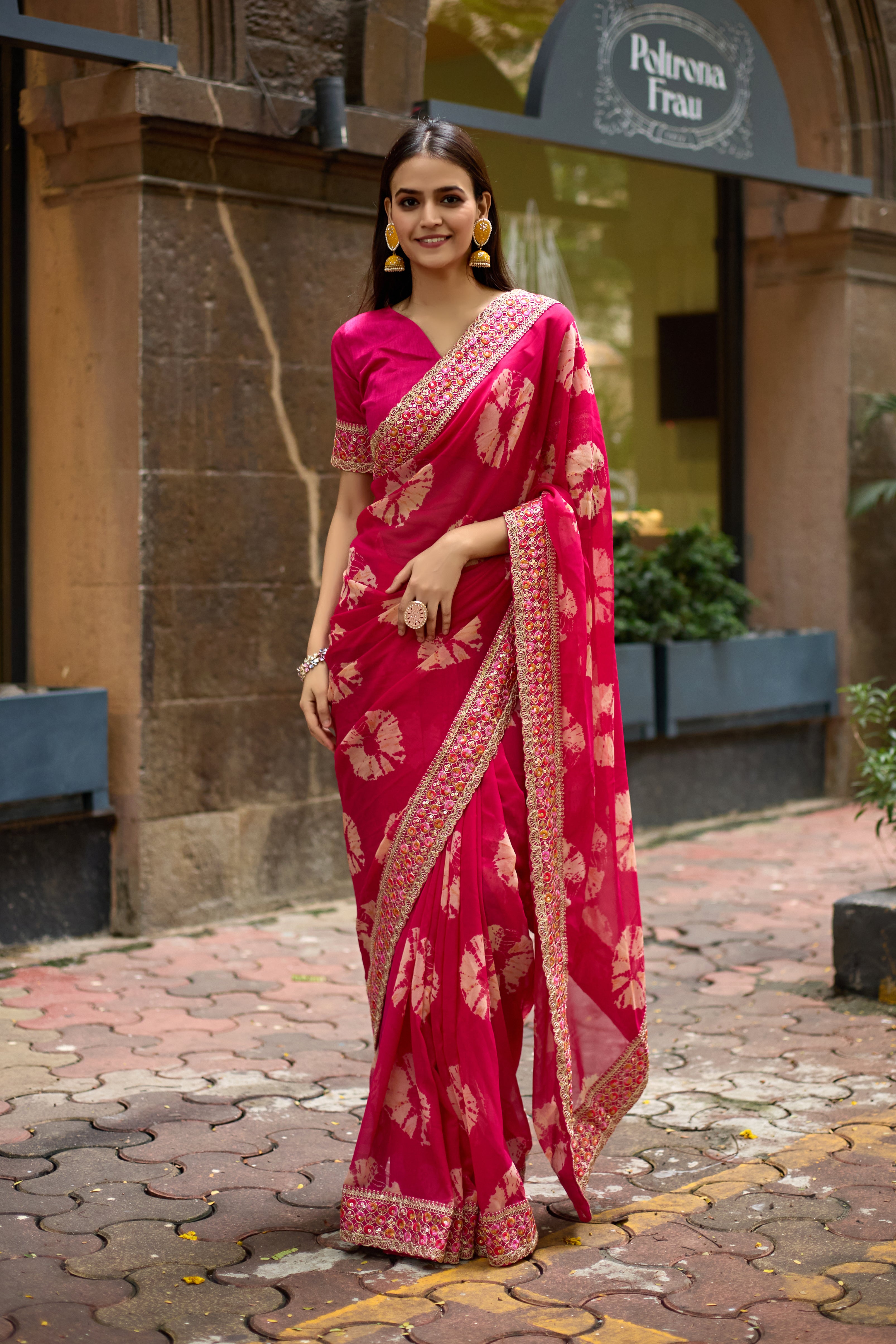 Vibrant Pink Batik Georgette Saree with Embroidered Border