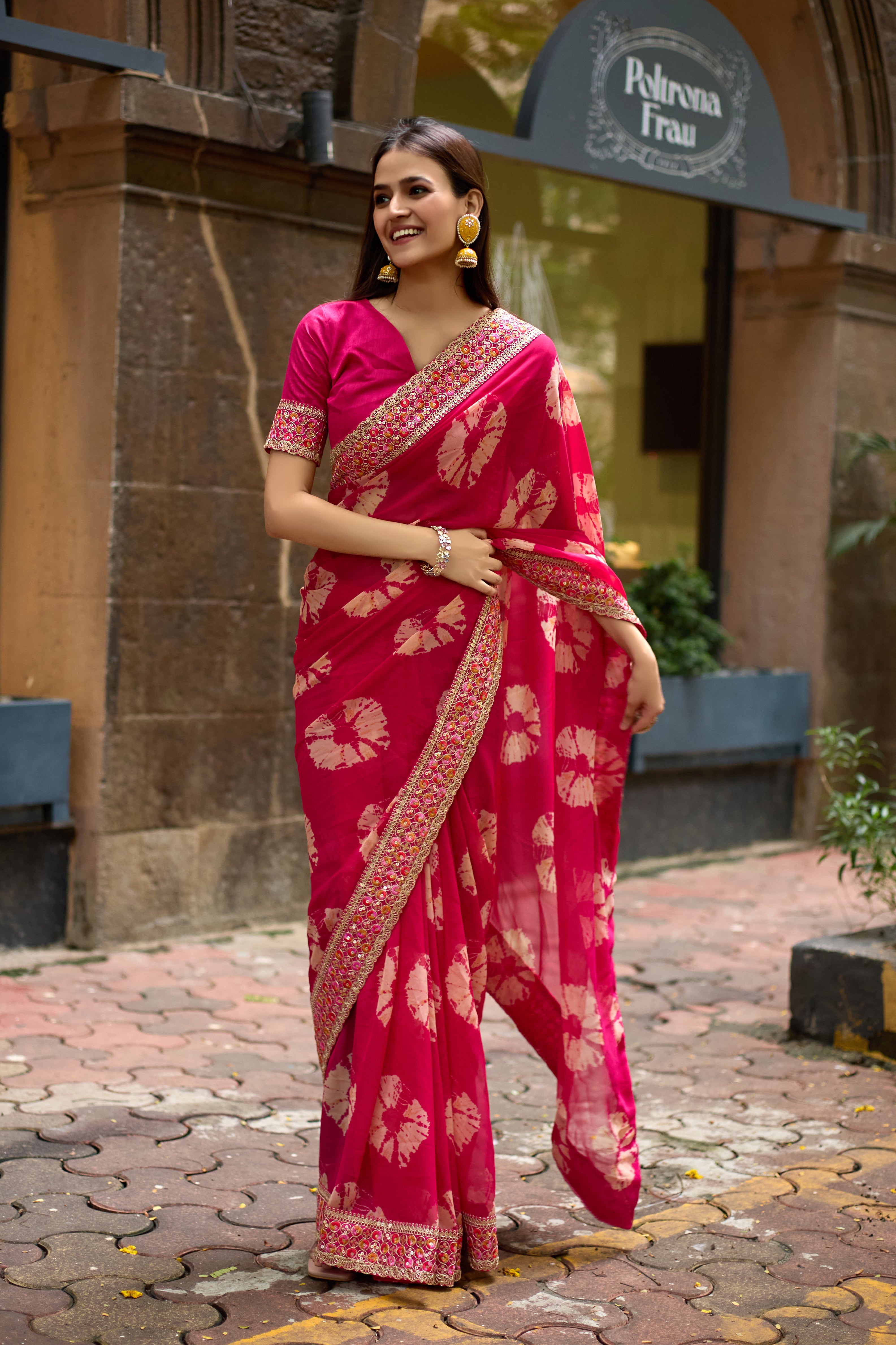 Vibrant Pink Batik Georgette Saree with Embroidered Border