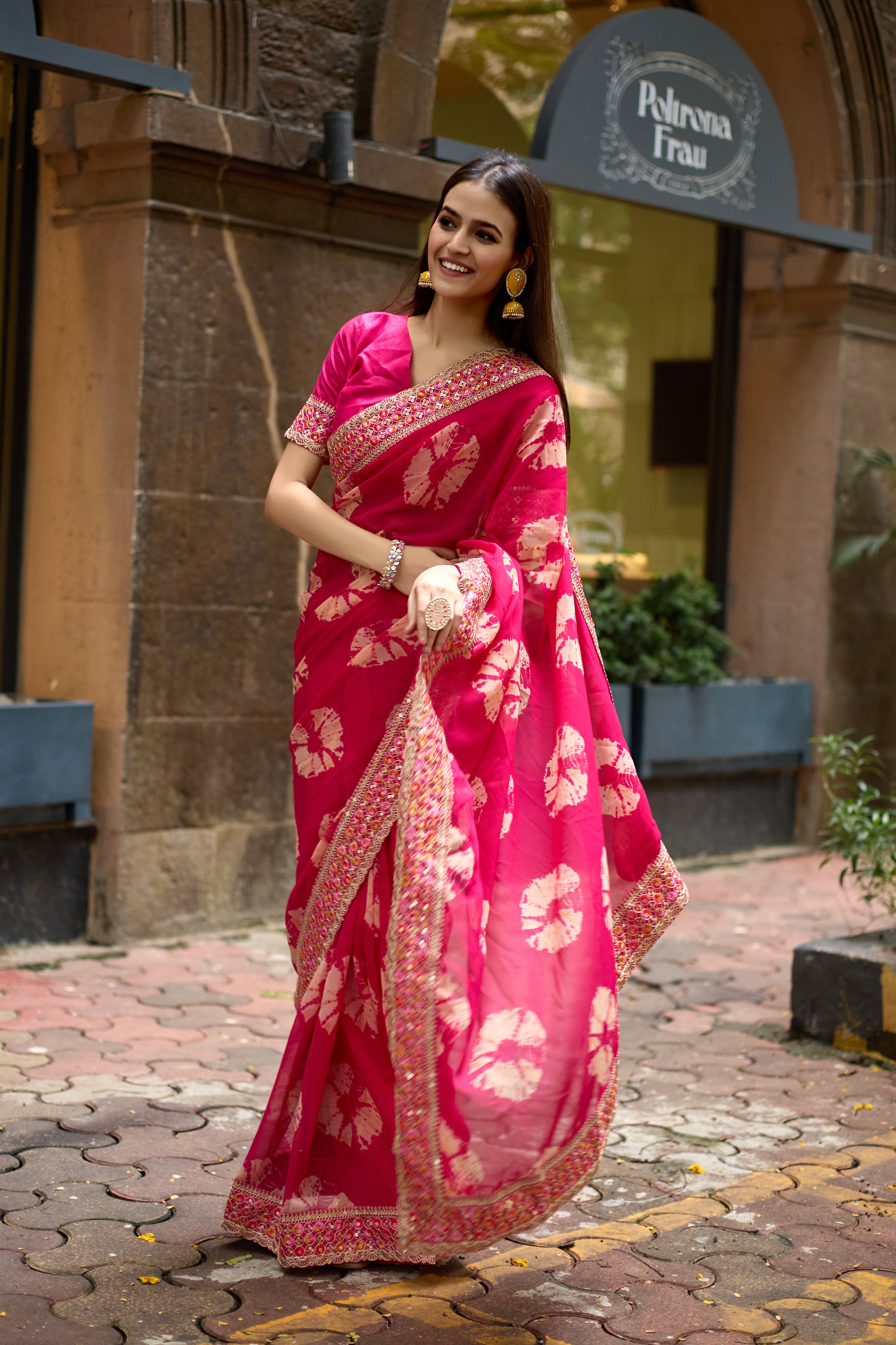 Vibrant Pink Batik Georgette Saree with Embroidered Border