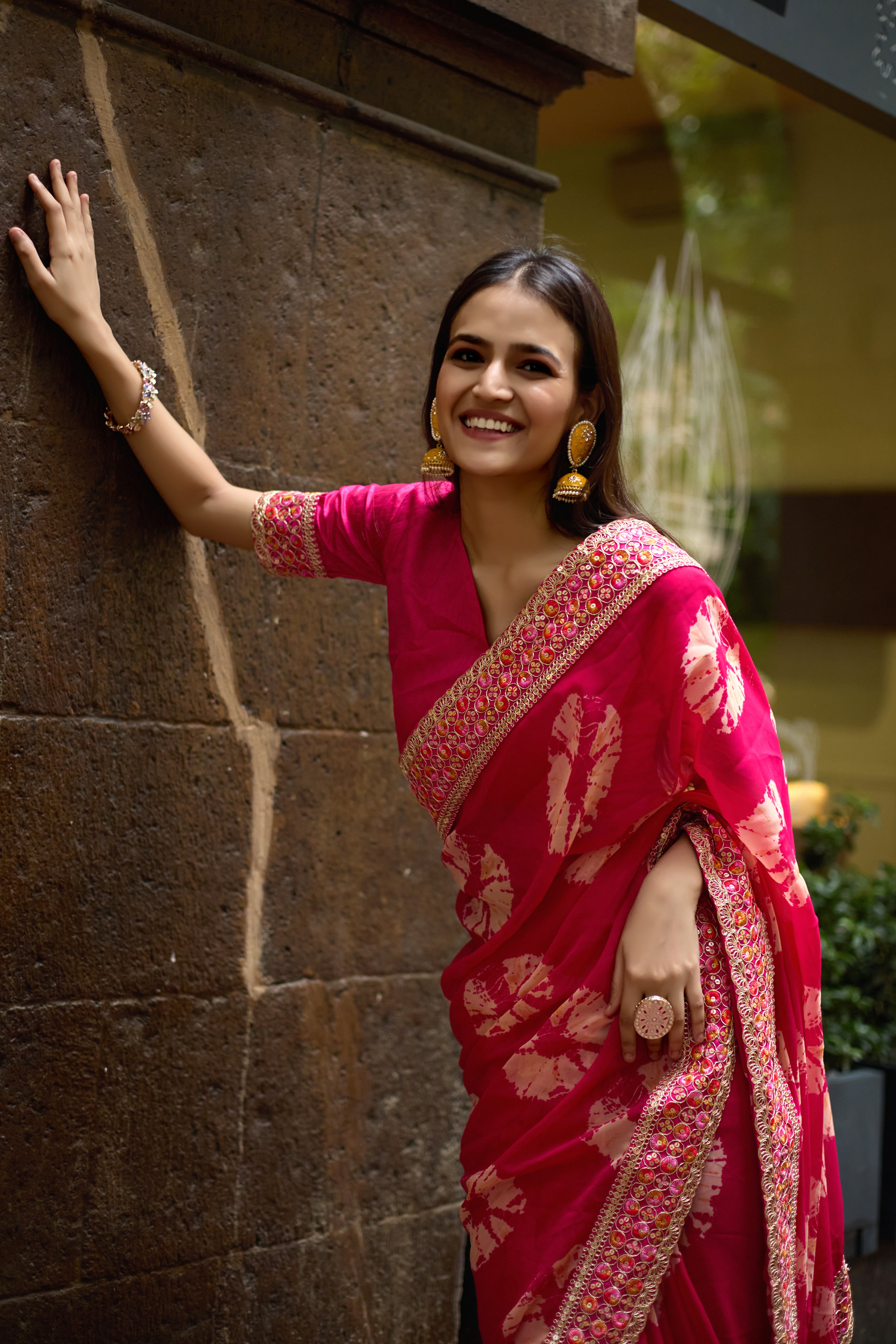 Vibrant Pink Batik Georgette Saree with Embroidered Border