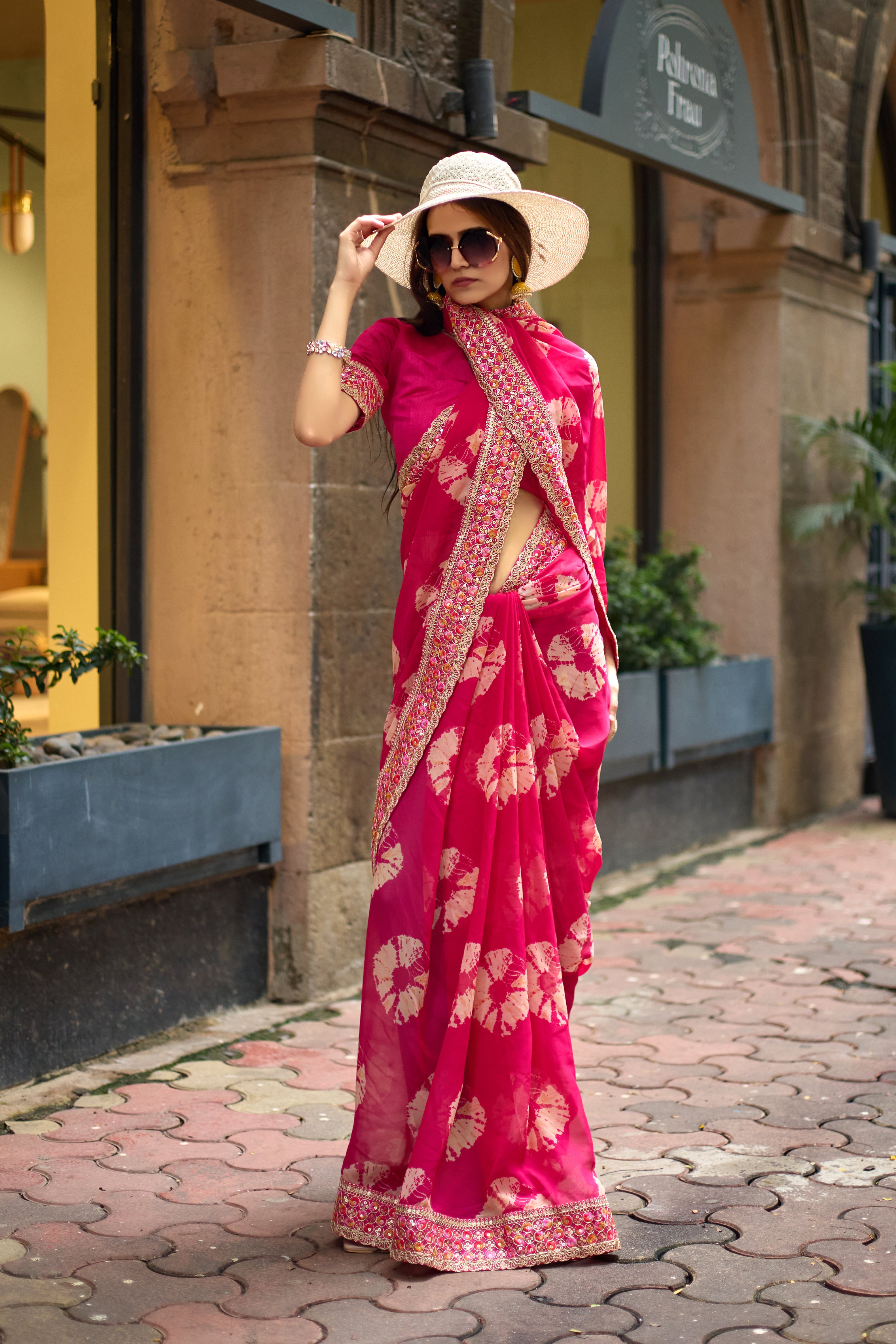 Vibrant Pink Batik Georgette Saree with Embroidered Border