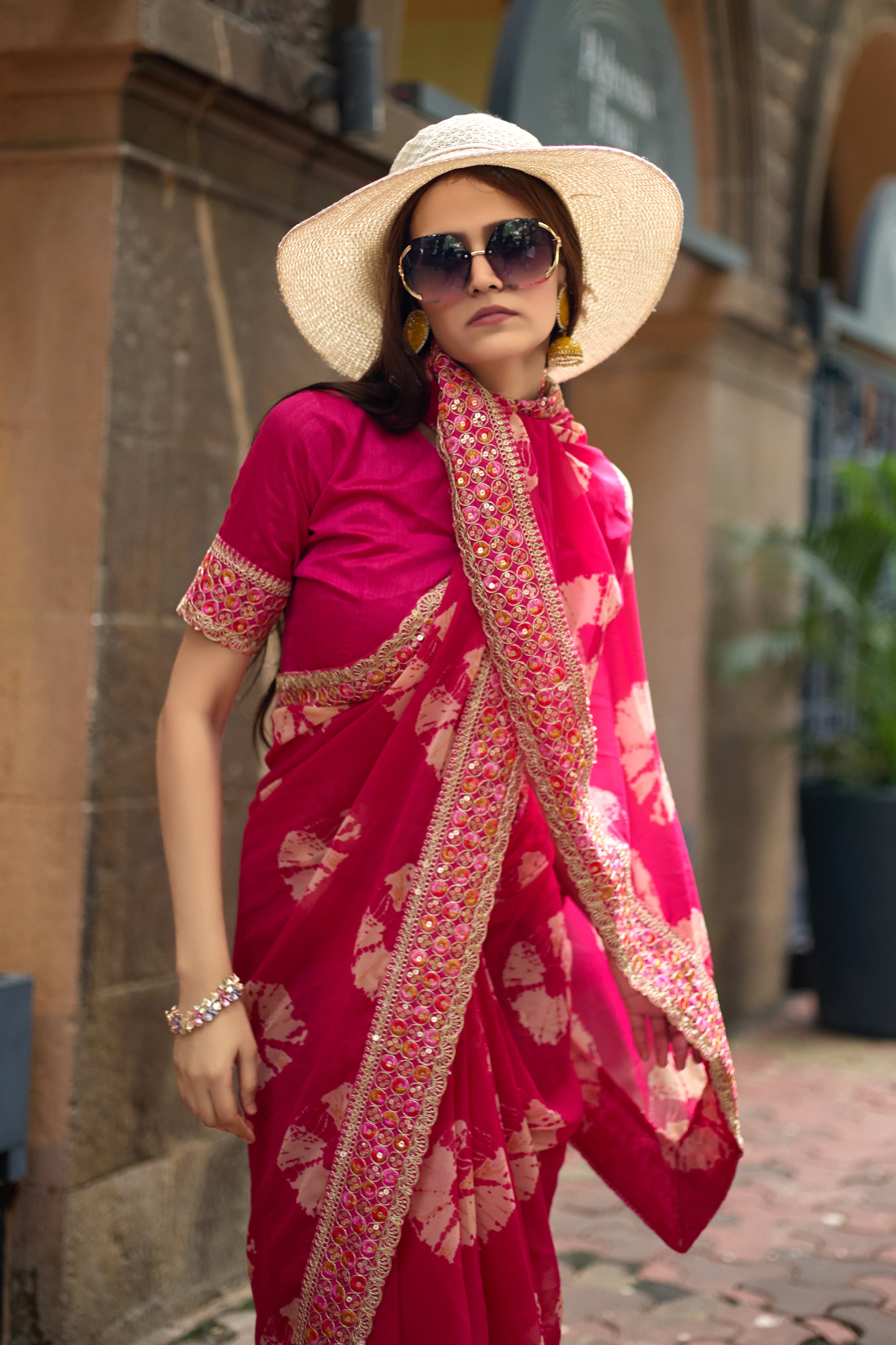 Vibrant Pink Batik Georgette Saree with Embroidered Border
