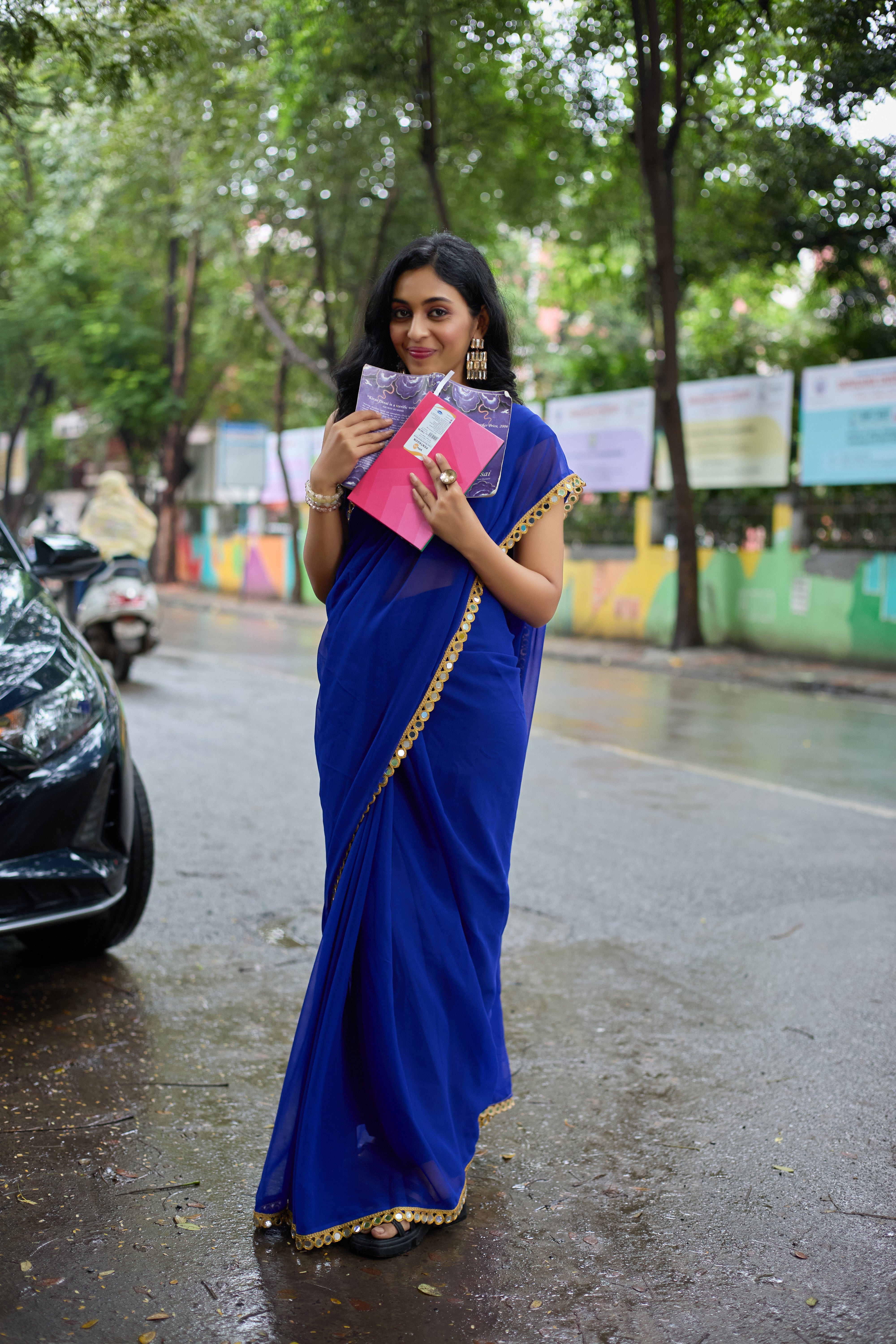 Royal Elegance Blue Georgette Saree with Golden Border