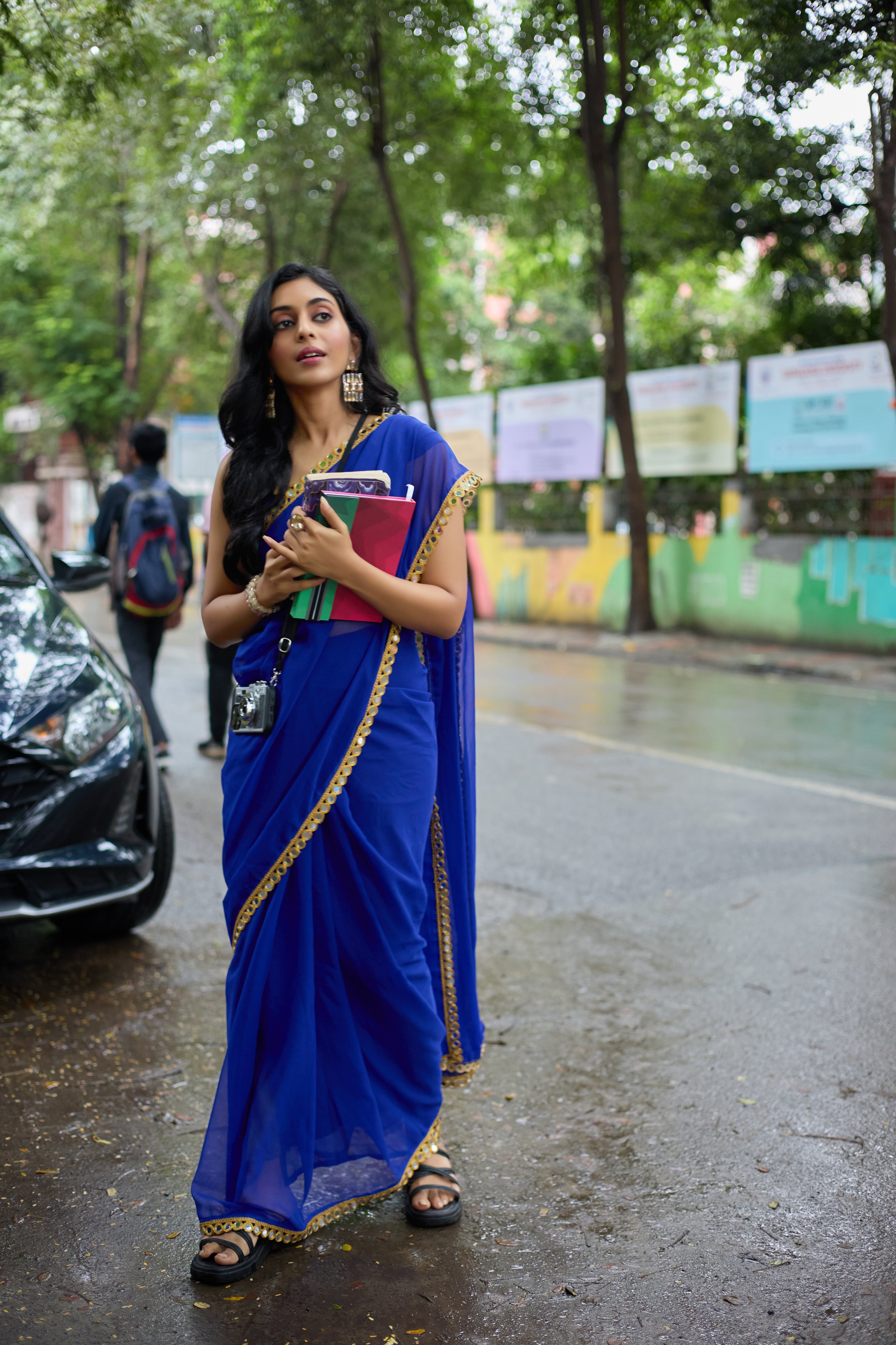 Royal Elegance Blue Georgette Saree with Golden Border