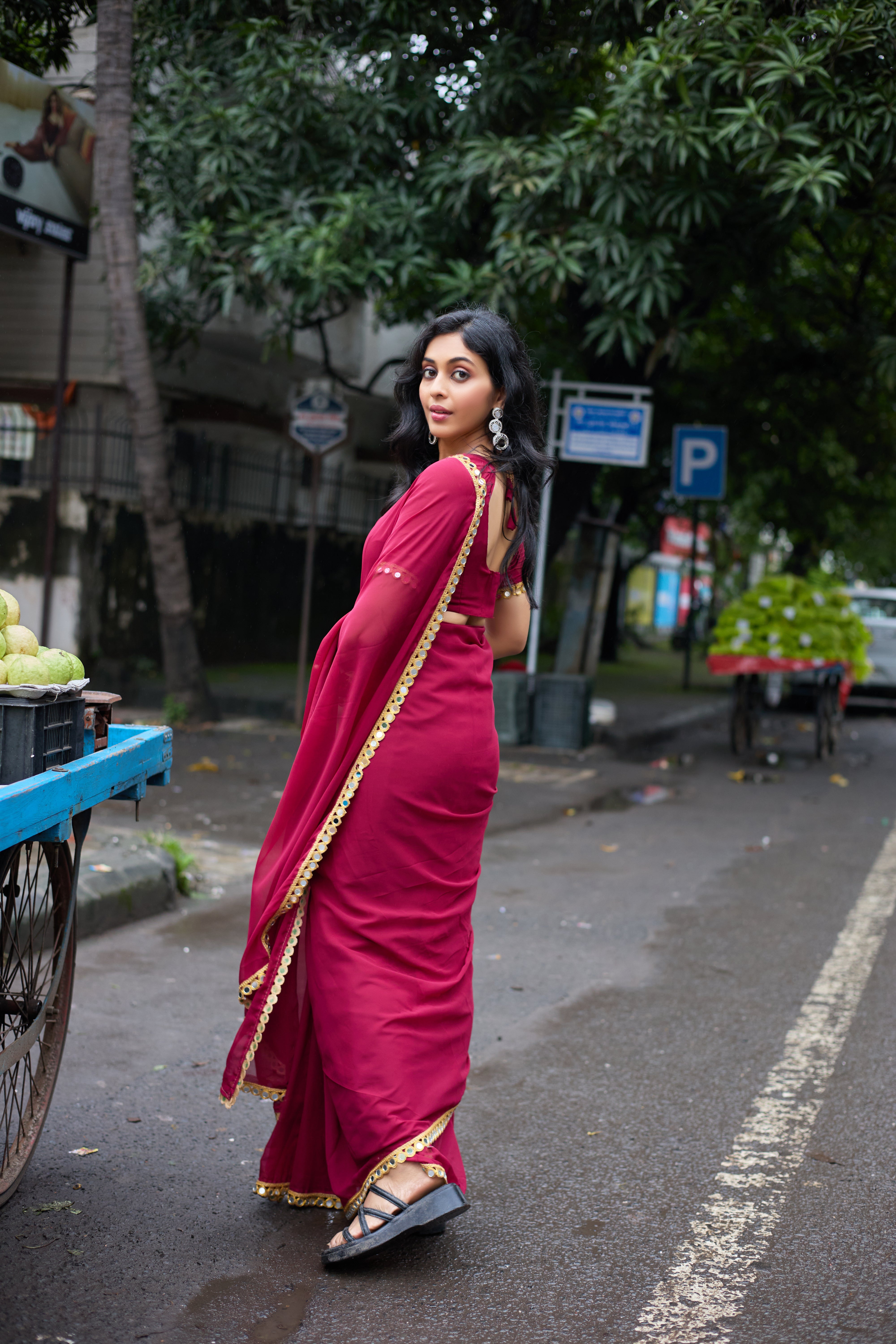 Graceful Charm Wine-Red Georgette Saree with Golden Border