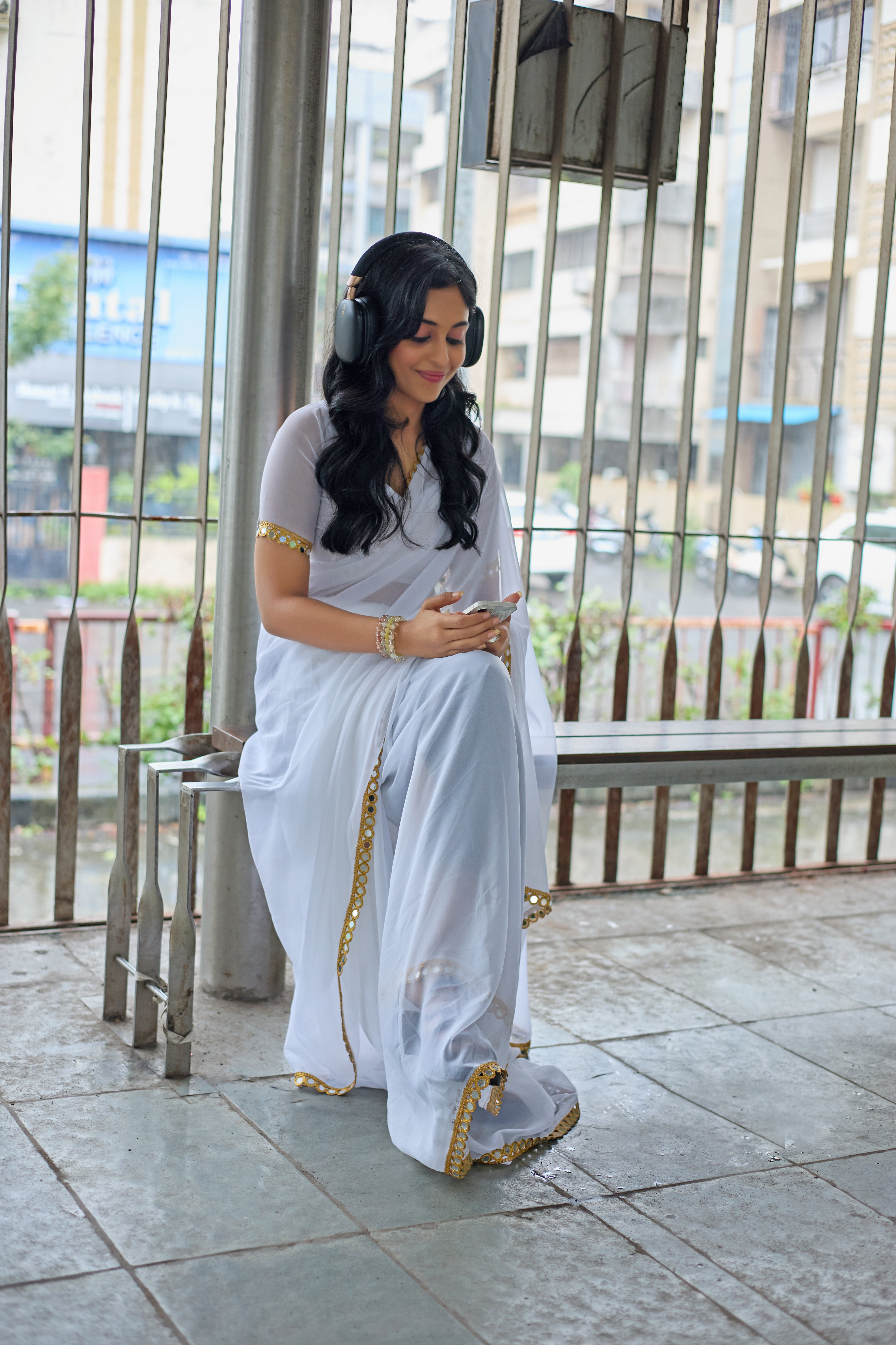 Elegant White Georgette Saree with Golden Embellished Border