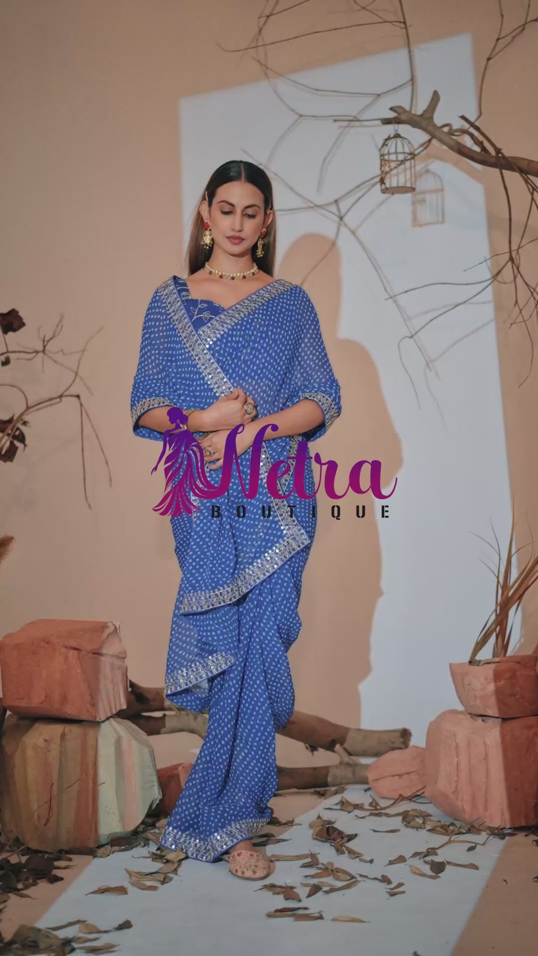 Midnight Elegance Royal Blue Georgette Saree with Golden Embellished Border