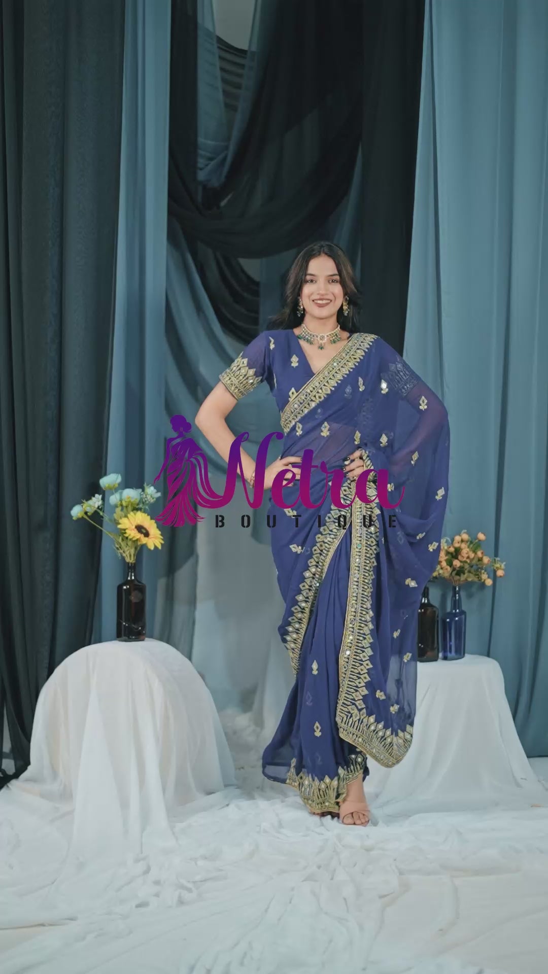 Elegant Navy Blue Georgette Saree with Golden Embroidered Border