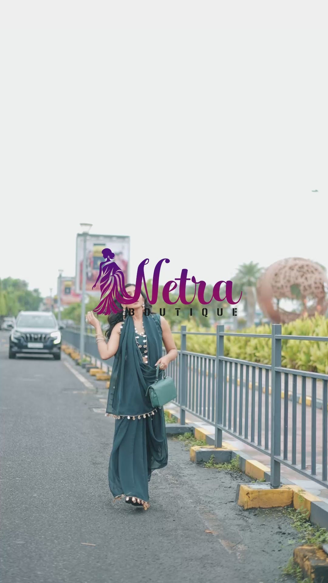 Designer Teal Georgette Saree with Gold Coin Border