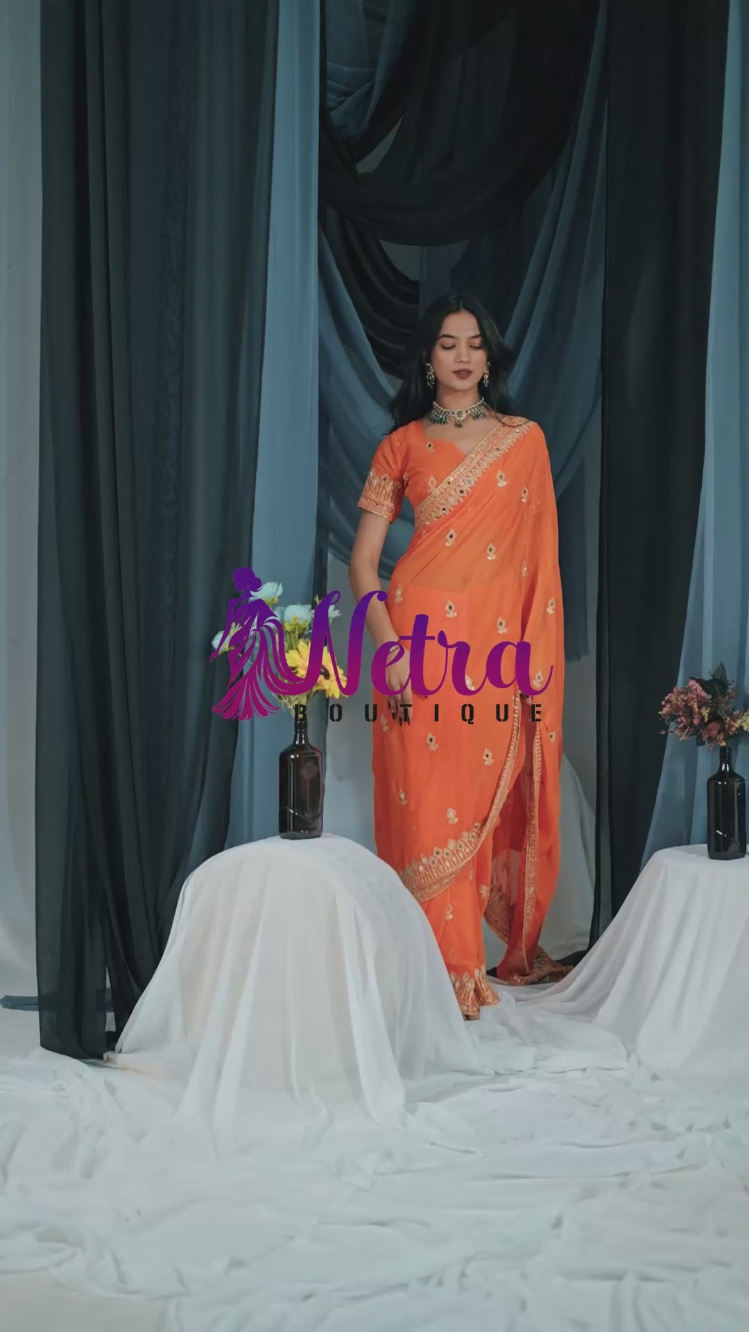 Elegant Orange Georgette Saree with Golden Embroidered Border