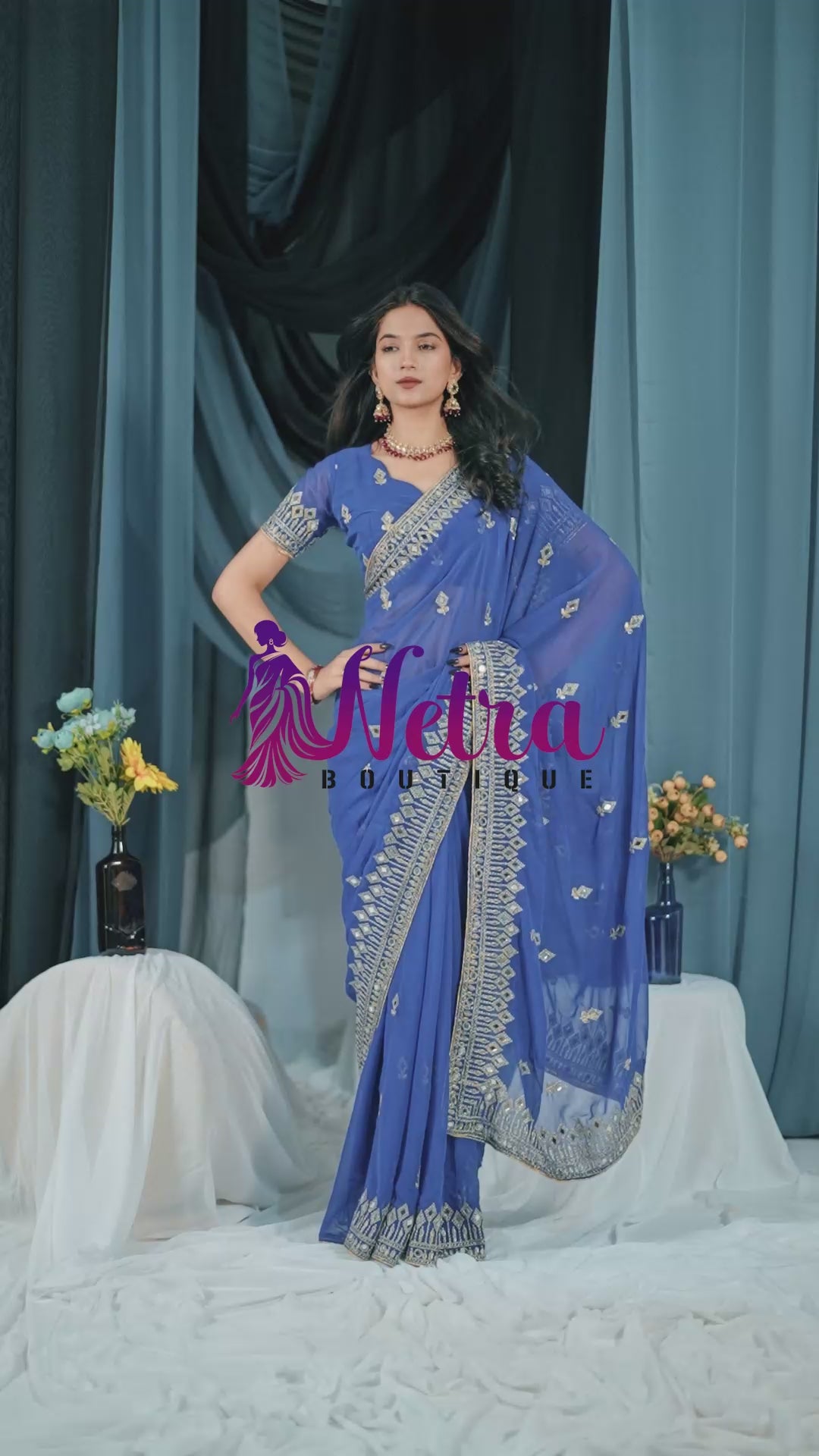 Elegant Blue Georgette Saree with Golden Embroidered Border