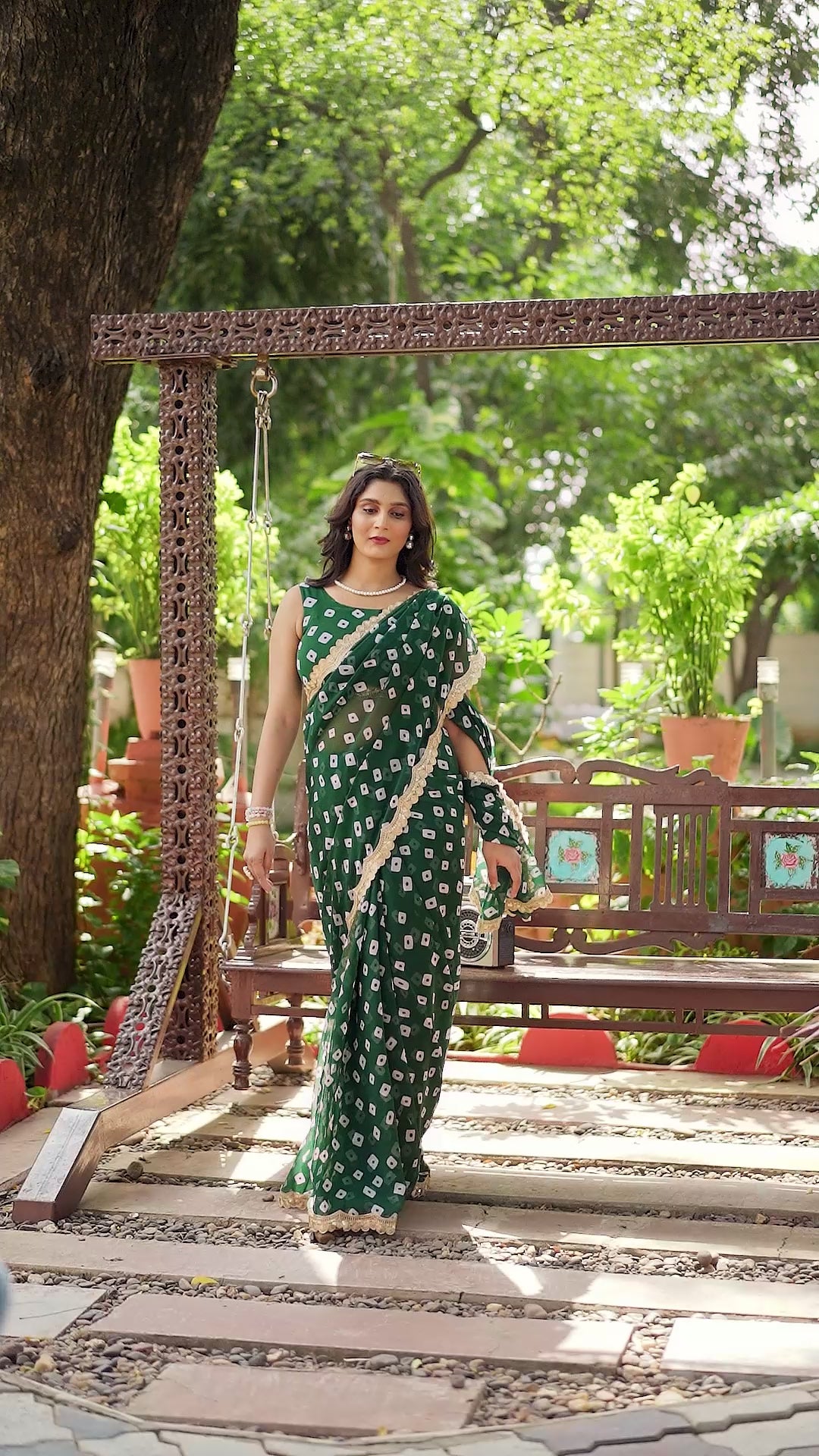 Fuchsia Bandhani Georgette Saree with Golden Lace Border