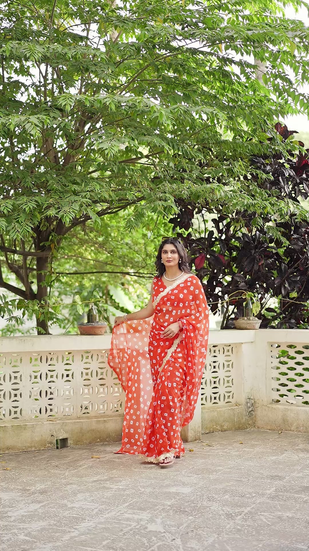 Fuchsia Bandhani Georgette Saree with Golden Lace Border