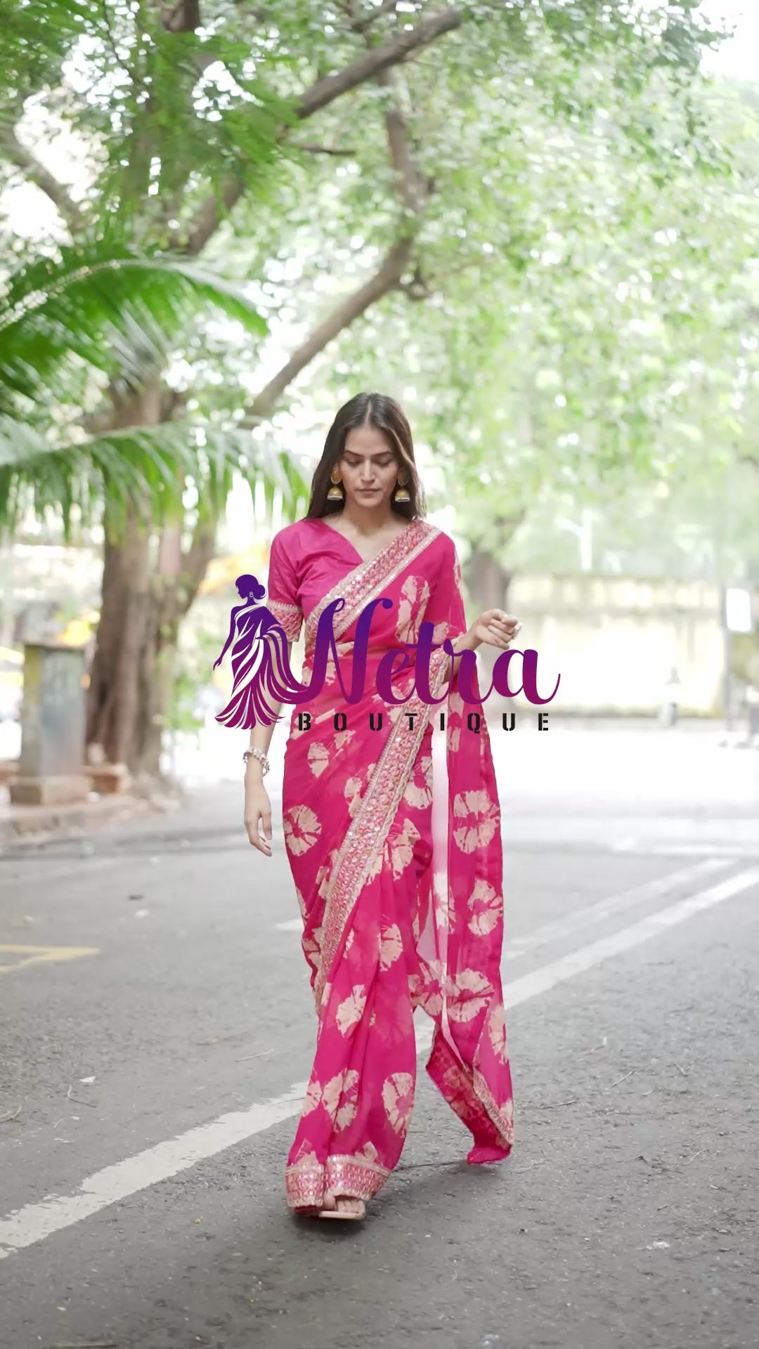 Vibrant Pink Batik Georgette Saree with Embroidered Border