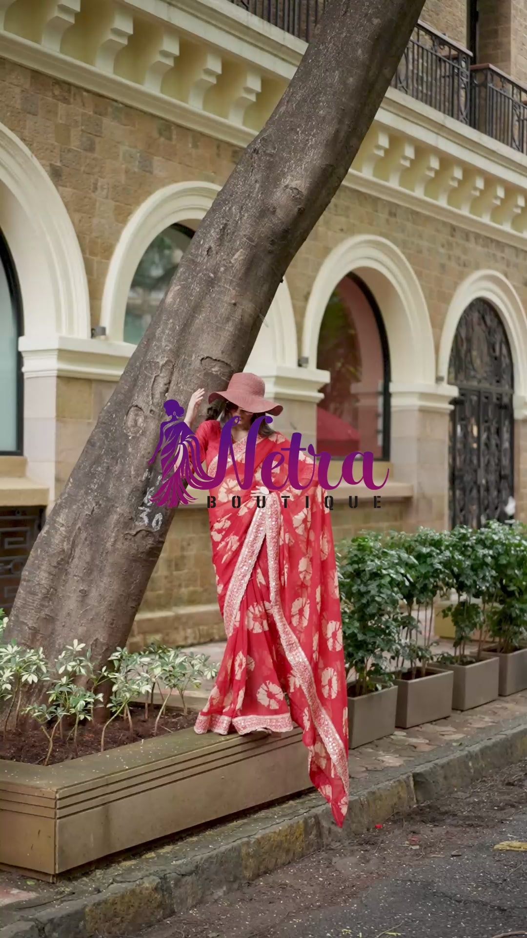Vibrant Red Batik Georgette Saree with Embroidered Border