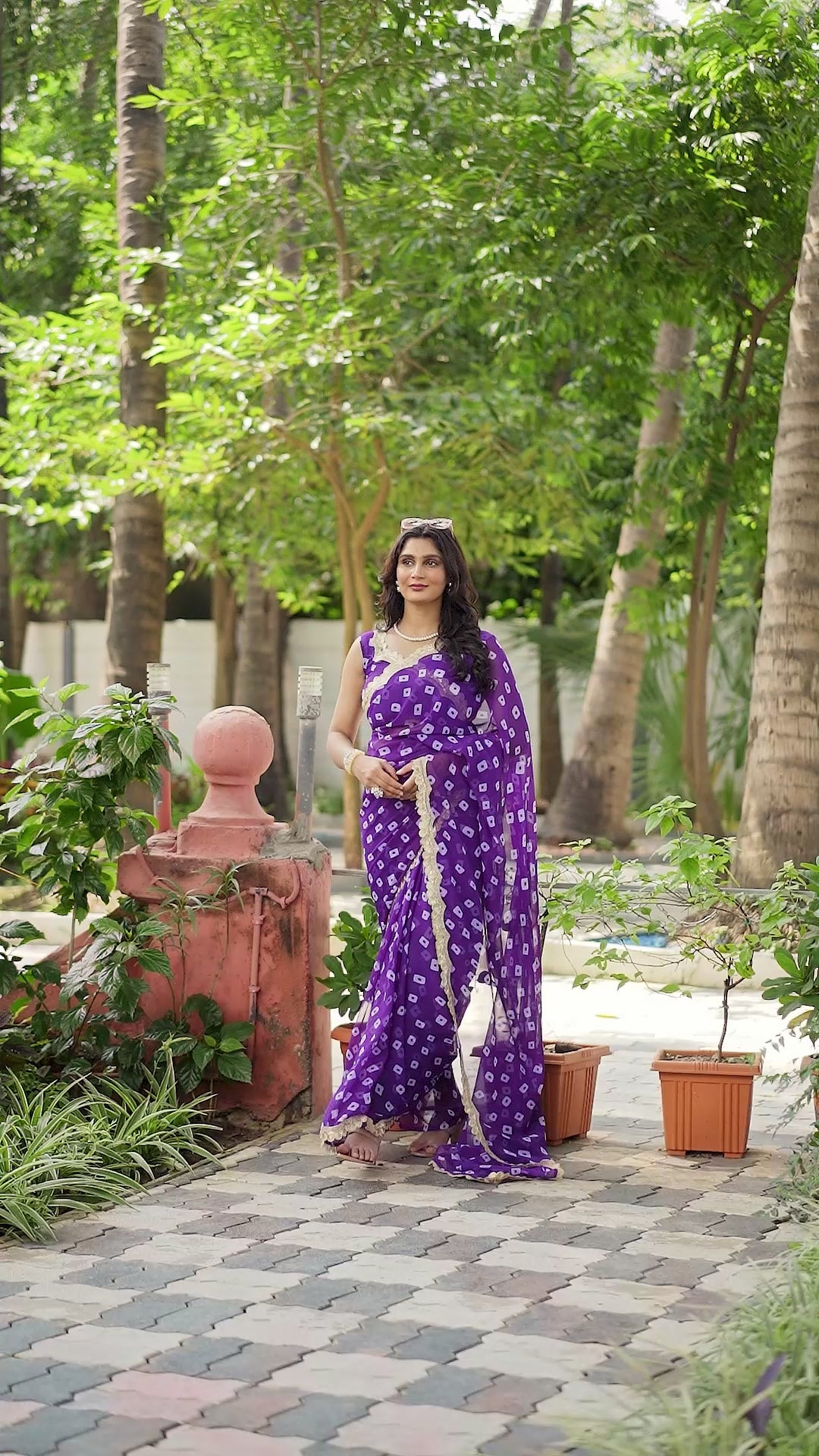 Fuchsia Bandhani Georgette Saree with Golden Lace Border