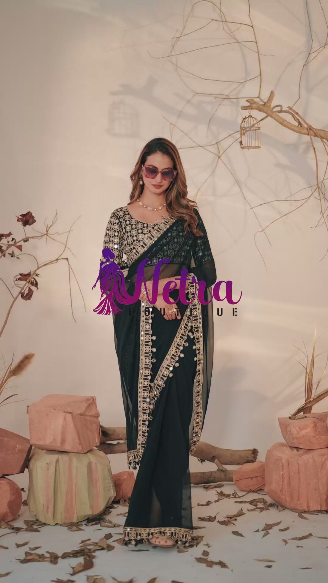 Designer Black Georgette Saree with Mirror Embellished Border