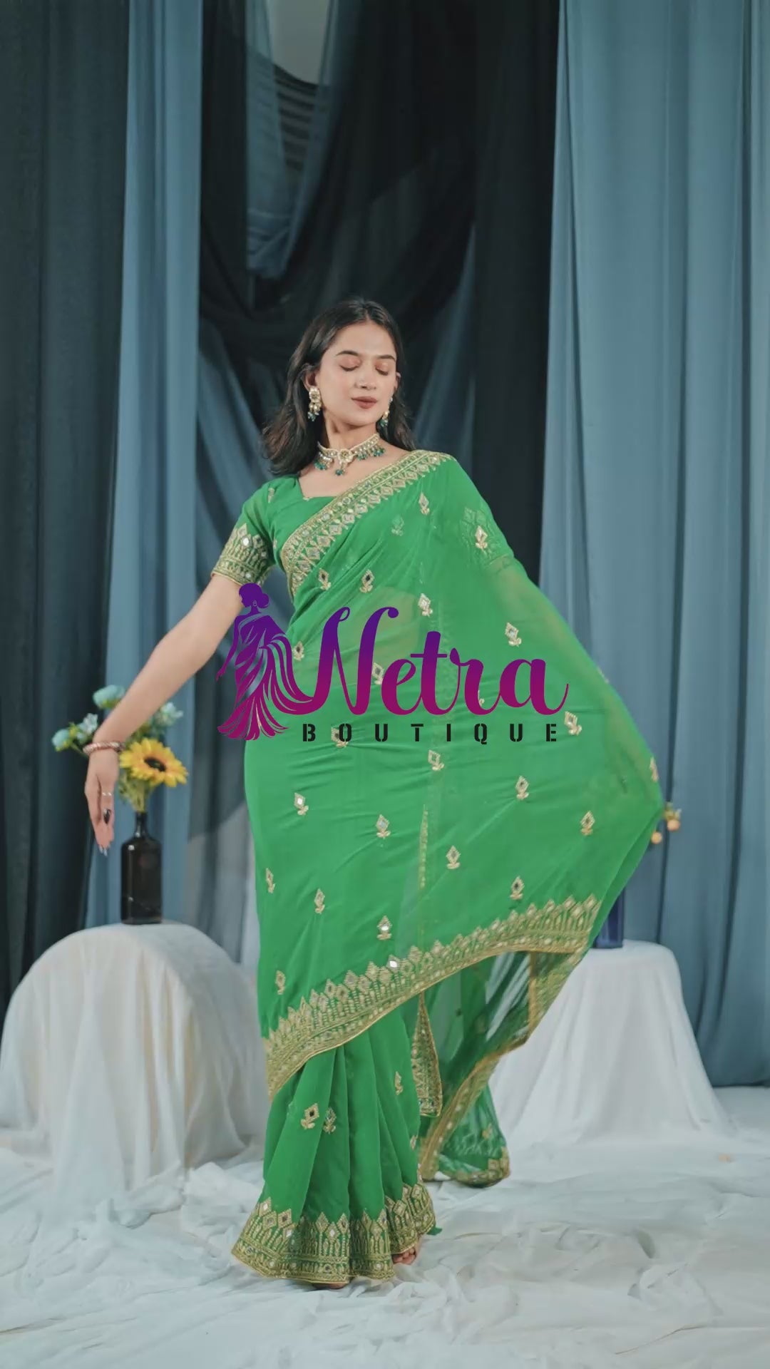Elegant Green Georgette Saree with Golden Embroidered Border